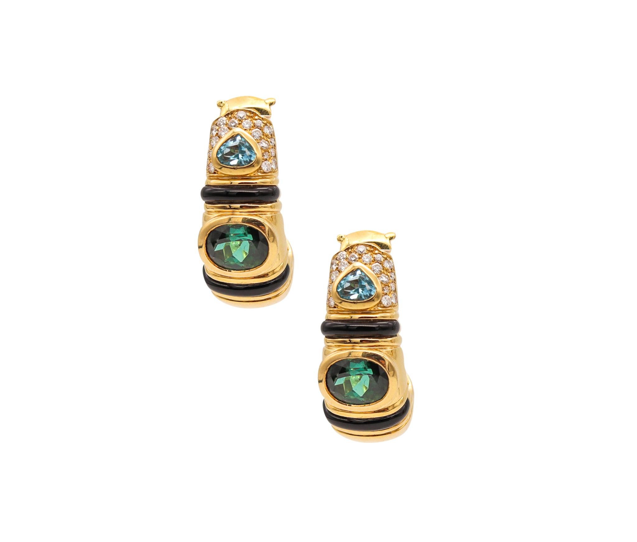 A pair of earrings designed by Marina B.

Elegant modern pieces, created in Milan Italy by the iconic jewelry house of Marina Bulgari. These pair of hoops earrings has been carefully crafted in solid yellow gold of 18 karats and suited with post
