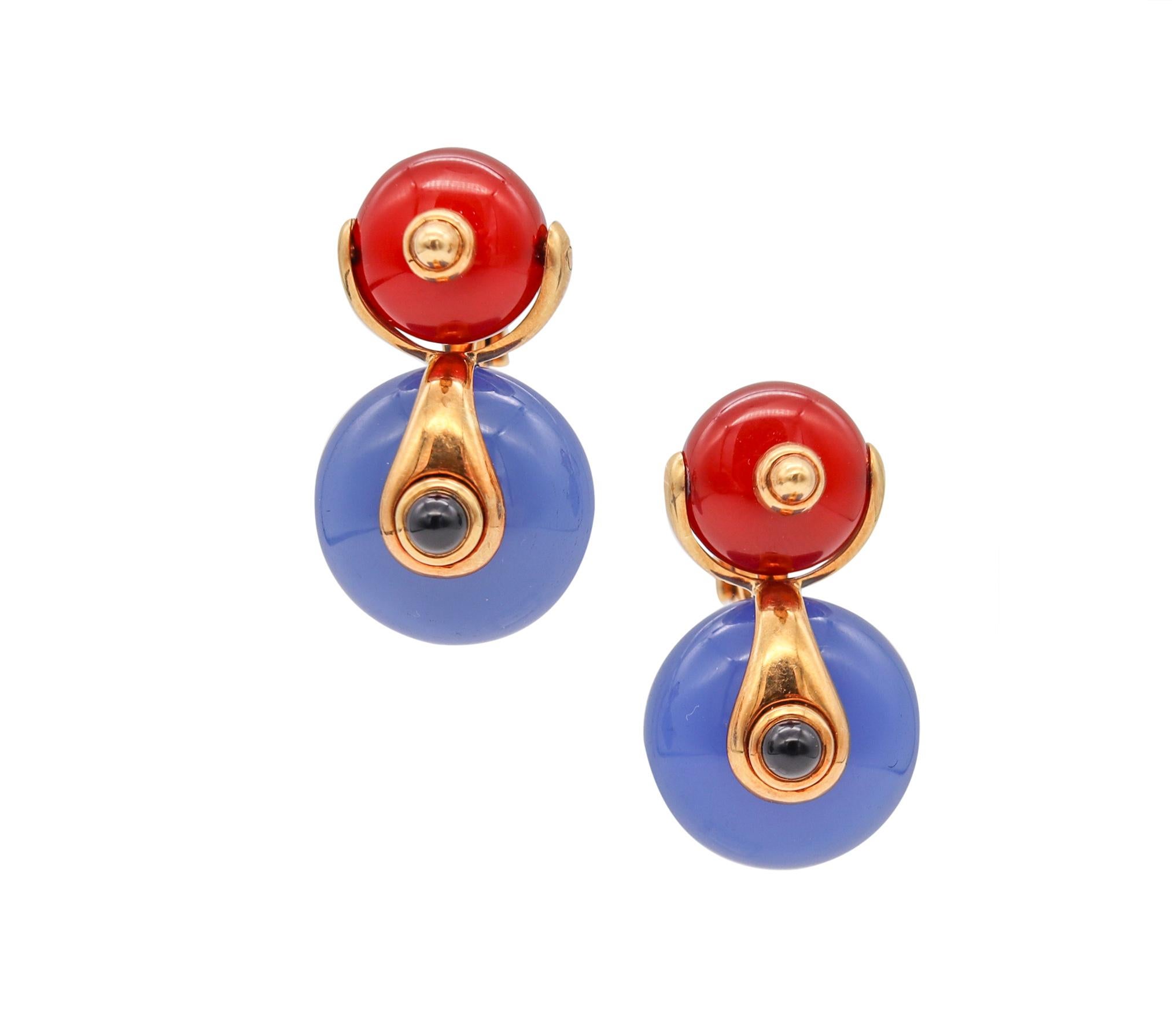 Large Cardan drop earrings designed by Marina B.

These iconic pieces are from the popular Cardan Unthreaded beads collection, designed back in the 1978 in Milan, Italy by Marina Bvlgari. This colorful drop earrings was carefully crafted in solid