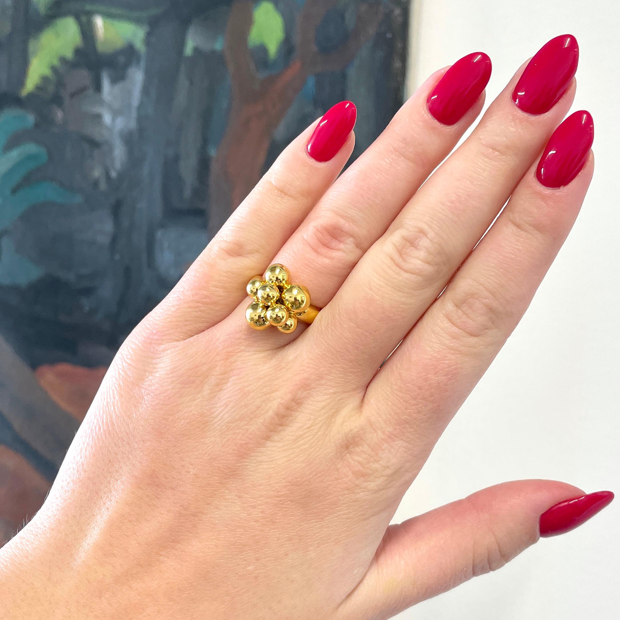 Treat yourself to a gold ring like no other. Solid large yellow gold and futuristic jewelry pieces are a very popular trend these days. This is Marina B Mini Atomo 18k Gold Ring. Signed #1885020. Circa 2010's.
Size 6 1/2 and can be resized, if