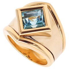 Marina B. Bague cocktail moderniste Alfa-Den en or massif 18Kt avec topaze bleue