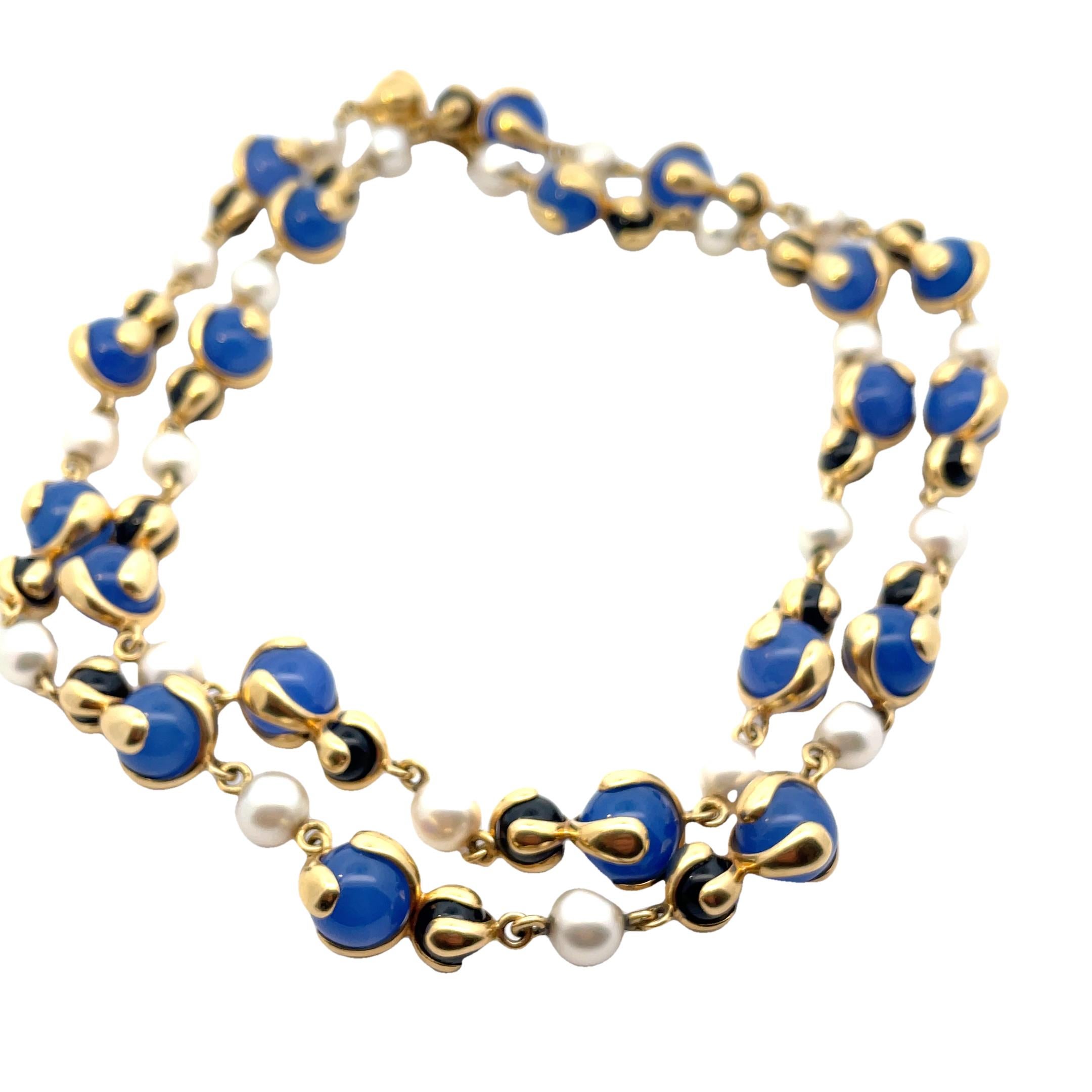 Vintage Long 18k gold necklace by Marina B, with 10.5 mm Blue Beads, 7mm onyx and 8mm pearls. Necklace is 84 cm long. Marked: Marina B, MB, Italy, 750. Weight - 131,5 grams.
Please note we have another one in Blue Beads and can be purchase togheter.
