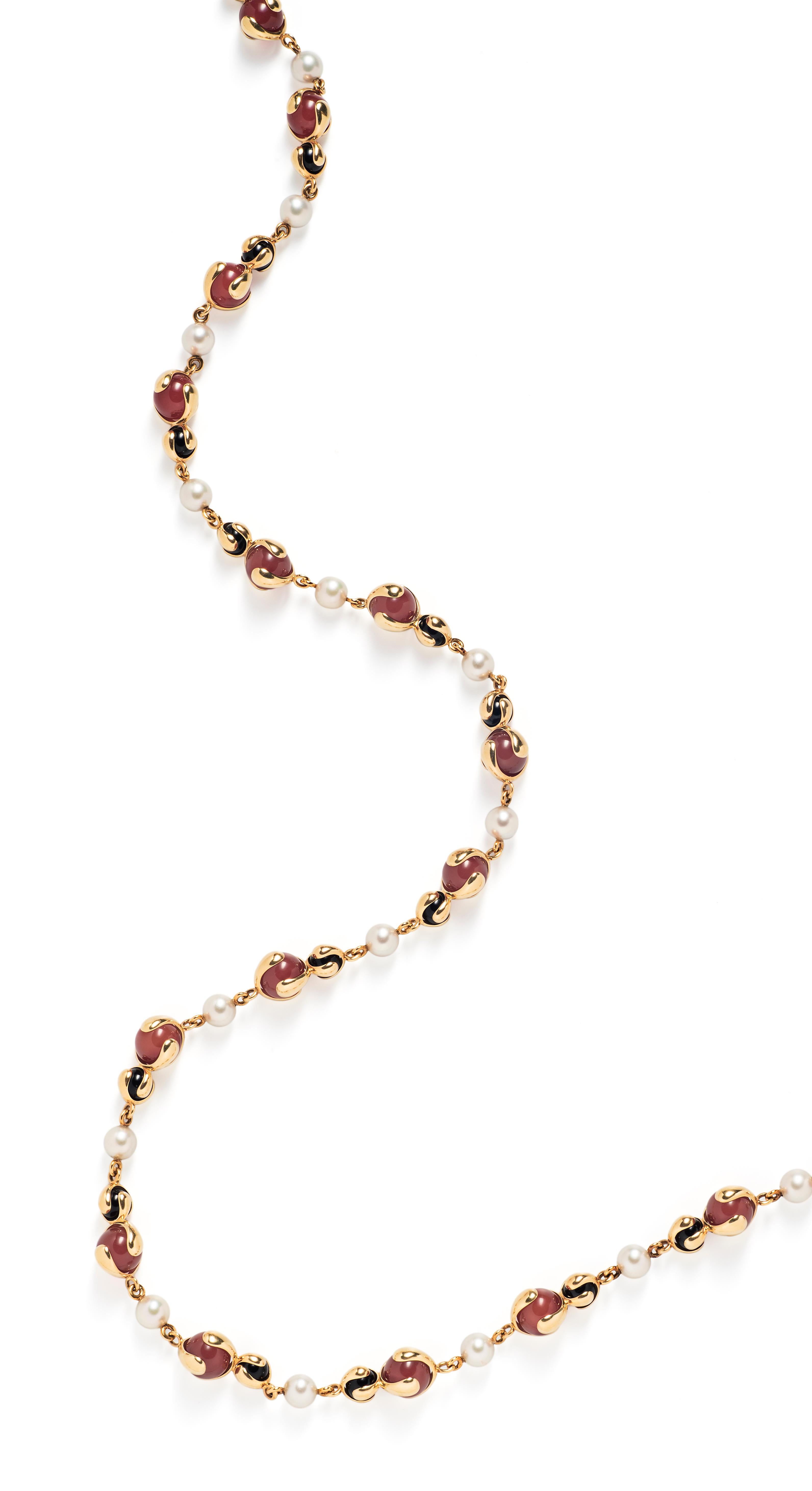Considered one of the most important women jewelers of the 20th century, Marina B. was a forward-thinking designer whose work transcended the style of her times. This elegant long station necklace from her late 80s Cardan Collection consists of a