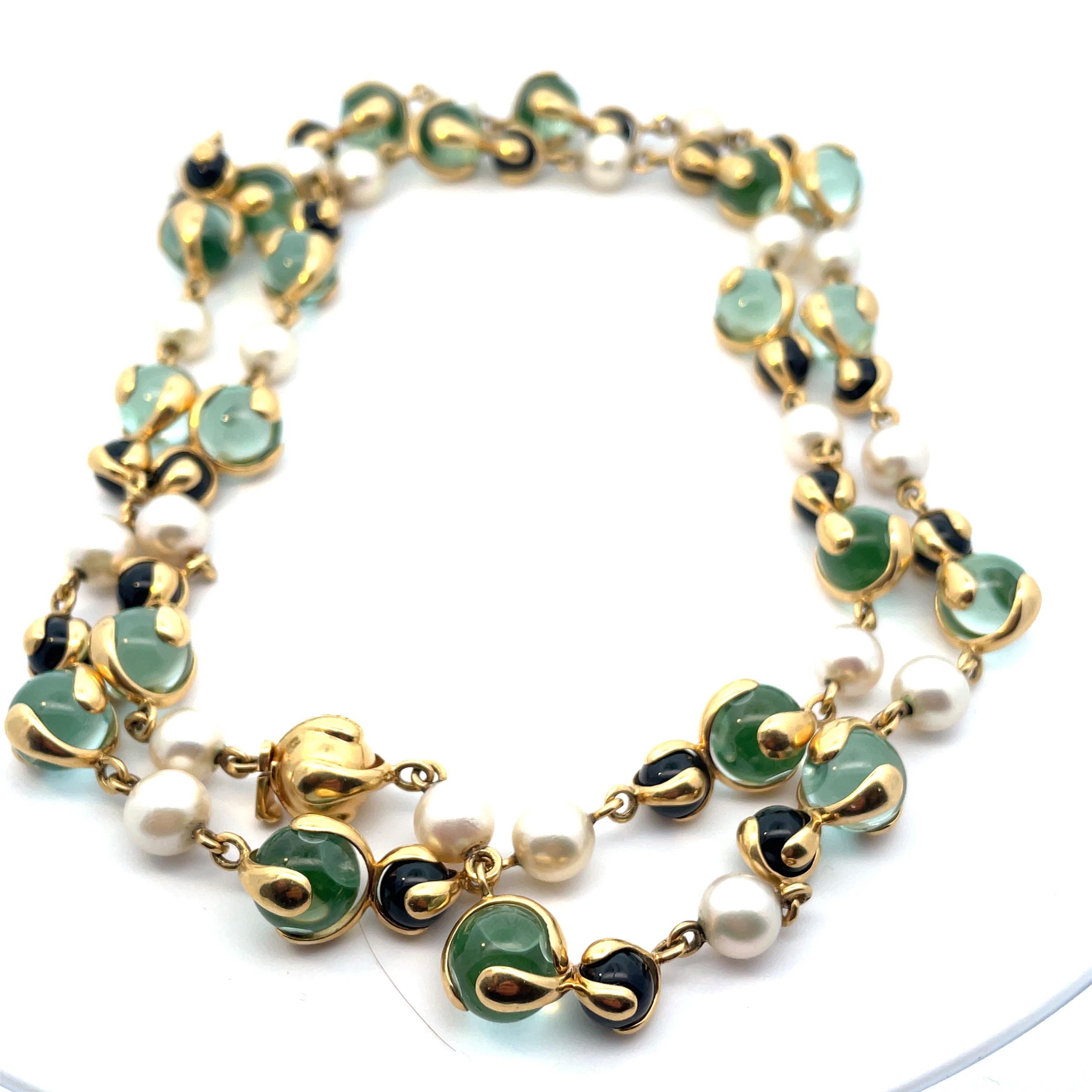 Vintage Long 18k gold necklace by Marina B, with 10.5 mm Tourmaline, 7mm onyx and 8mm pearls. Necklace is 84 cm long. Marked: Marina B, MB, Italy, 750. Weight - 131,5 grams.
Please note we have another one in Blue Beads and can be purchase togheter.
