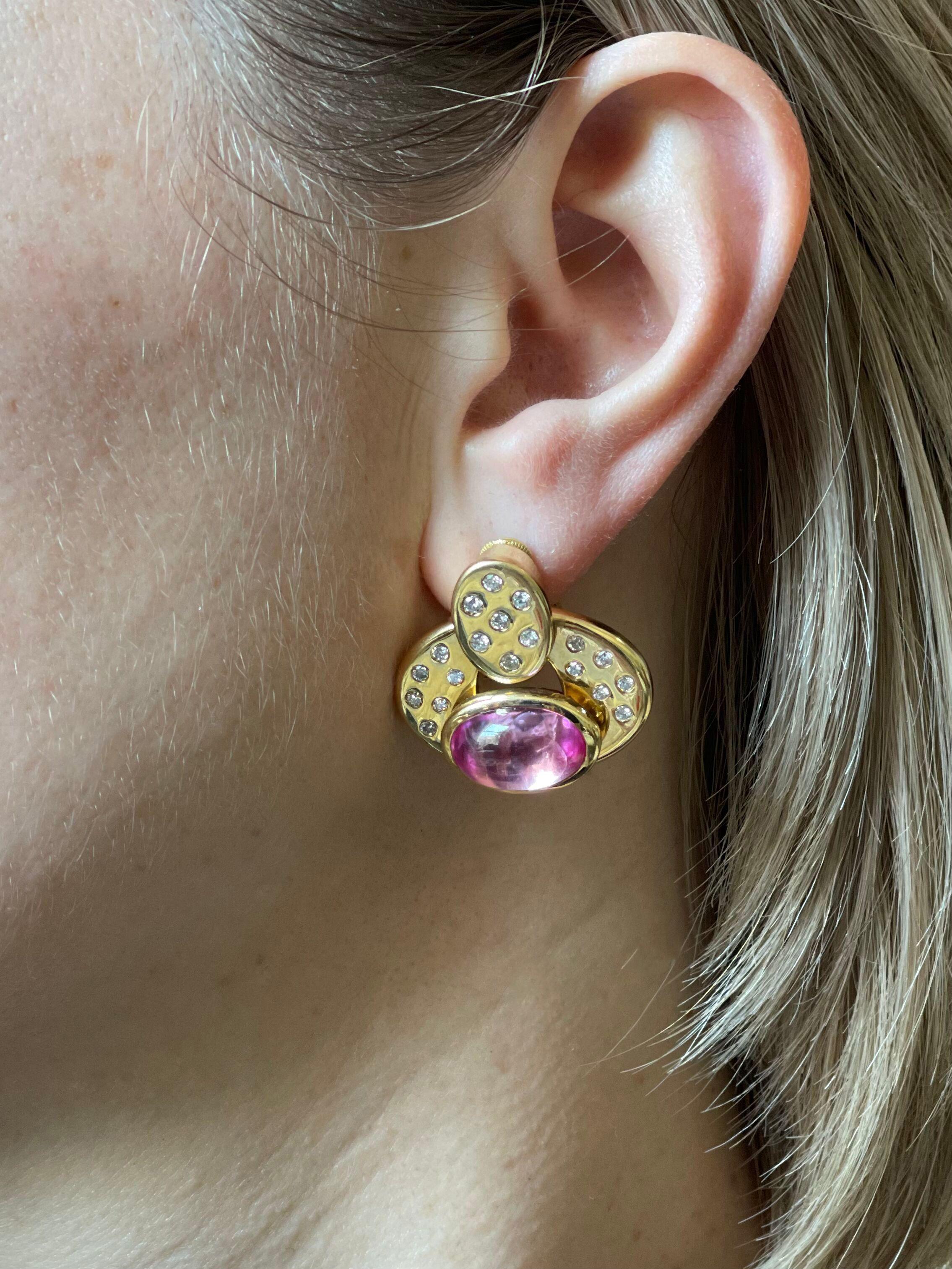 Pair of 18k gold earrings by Marina B, set with oval 15 x 10mm pink tourmaline cabochons, and approx. 0.80ctw G/VS diamonds. Earrings measure 1 1/8