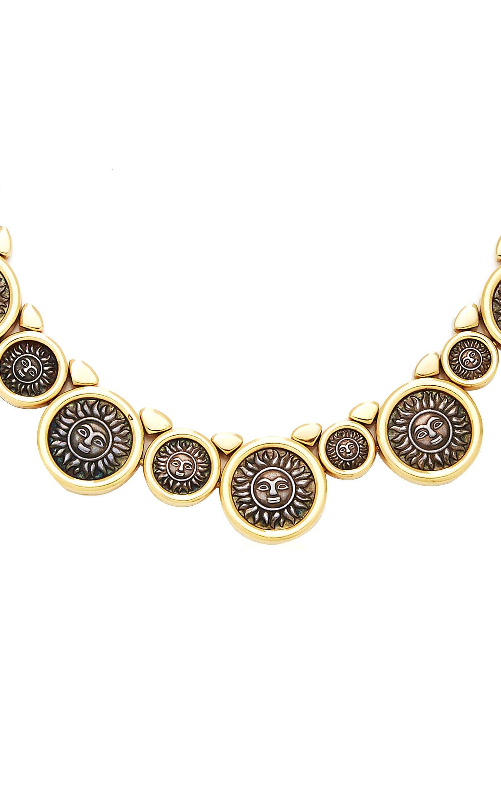 An unusual Marina B Necklace in 18kt yellow gold with silver solar coins. Made in Italy, circa 1980s.