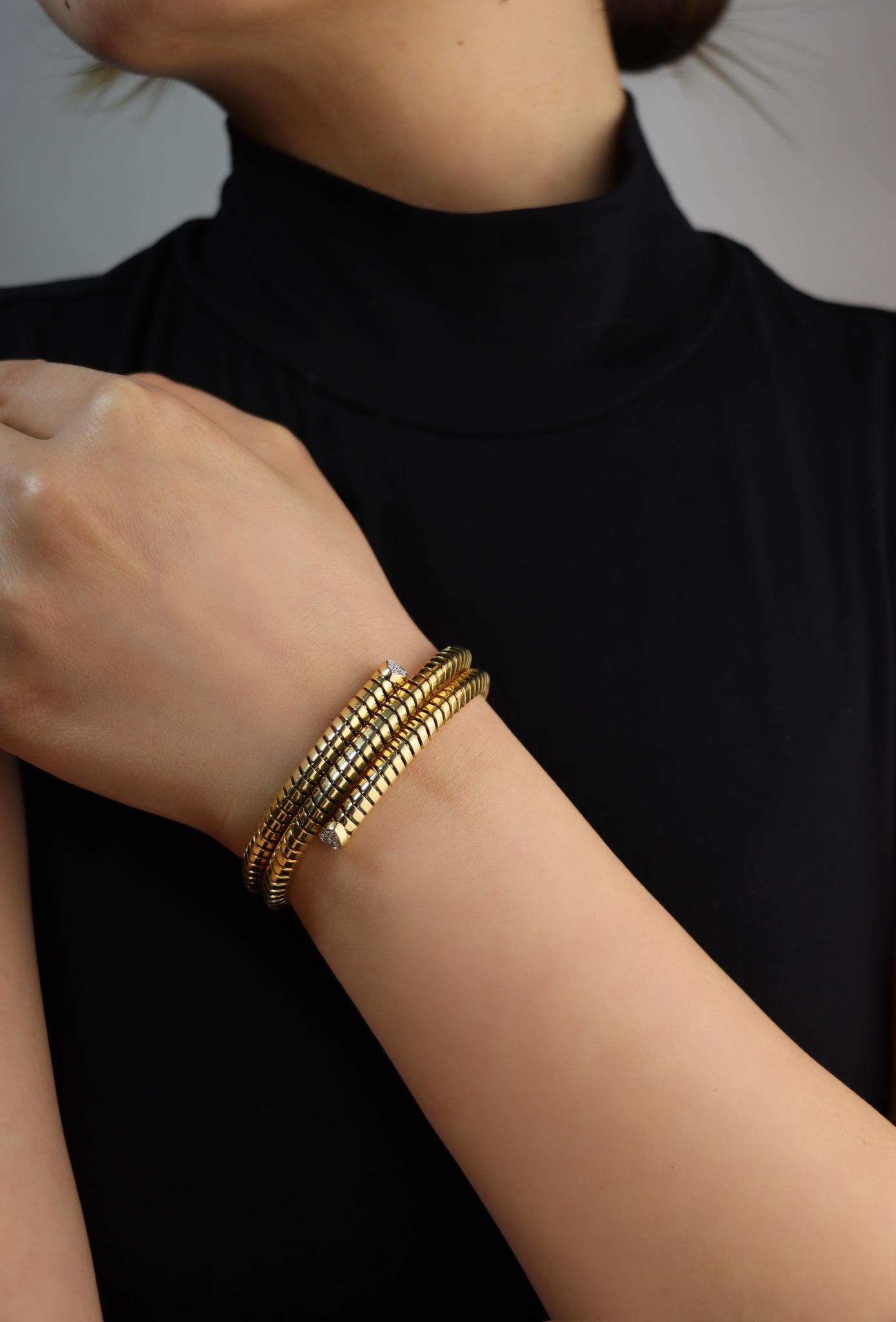 Marina B Trisolina 18k Yellow Gold Triple Pavé Diamond Bangle

Marked:
Marina B
Made in Italy
AU 750
MB 500067
S

Approximate Dimensions:
15.5 cm (Circumference) 
1 cm - 1.5 cm (Width) 
39.1 grams in weight.