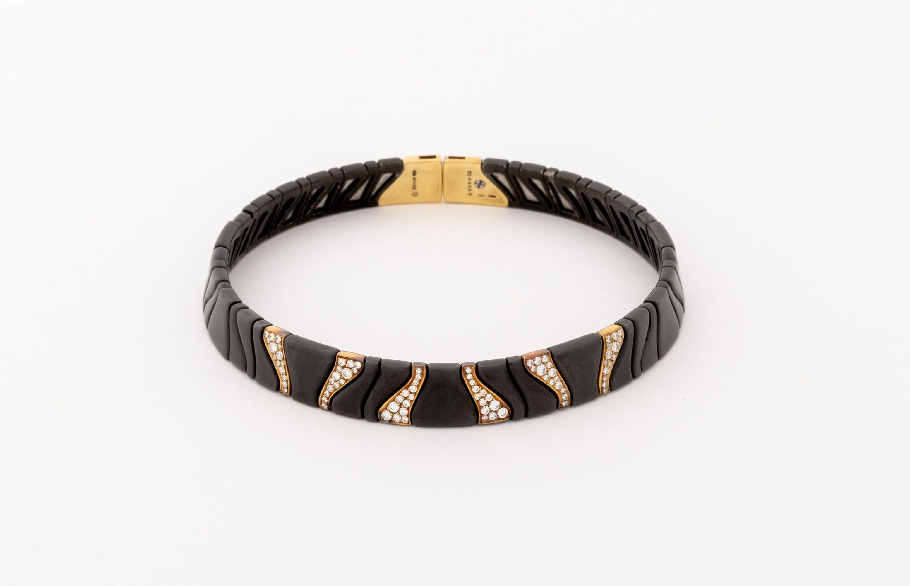 Marina B. 18K Yellow Gold 
Blackened Steel Diamond Collar Necklace, featuring blackened steel links, six yellow gold links adorned with eighty two pave set round faceted diamonds weighing a total of approx. 1.55 carat, terminated with yellow