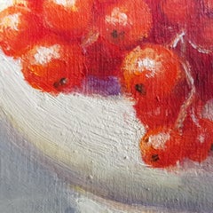 "Red currant lights in white porcelain"