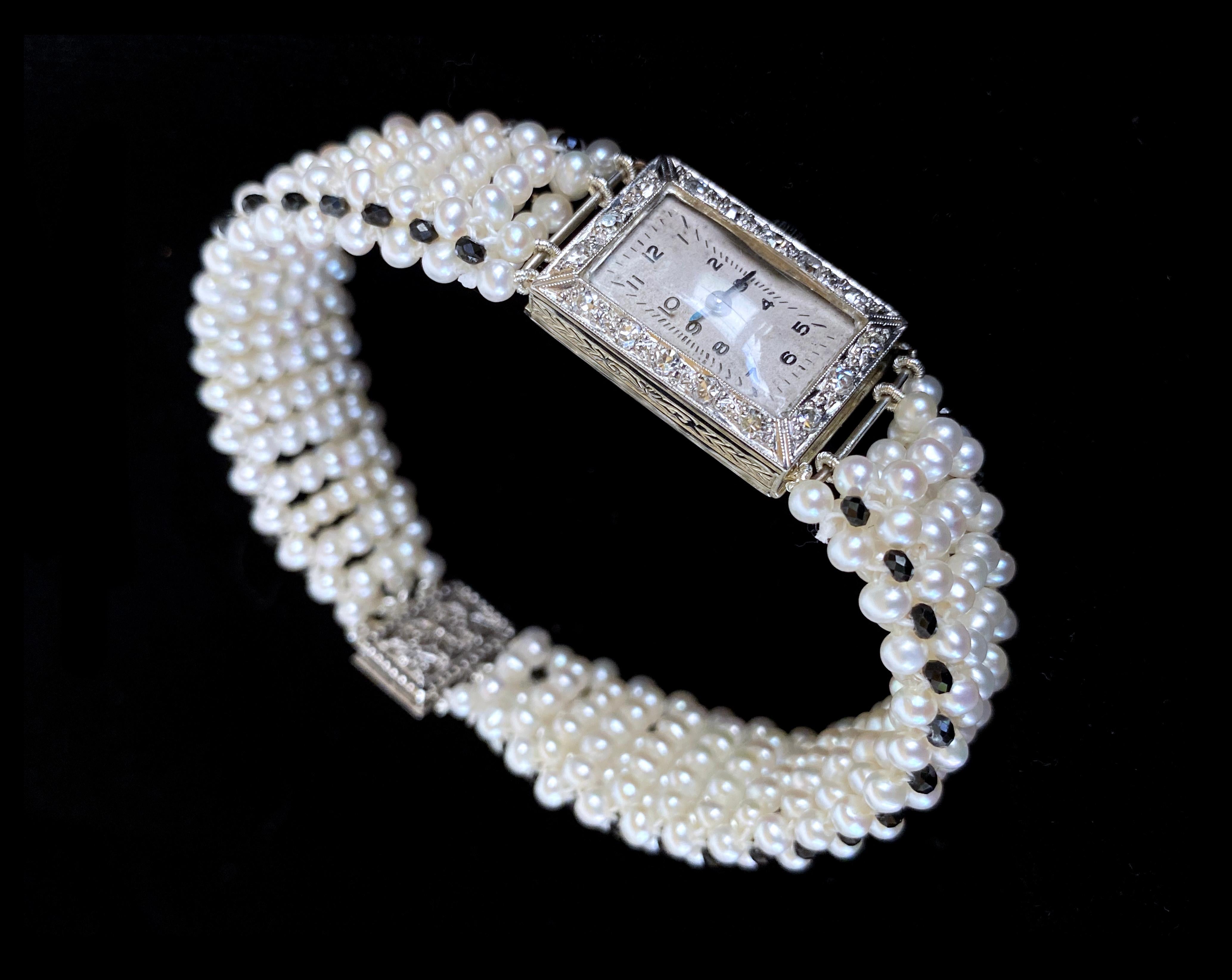 One of a Kind piece by Marina J. This unique bracelet features a vintage 18k White Gold Diamond encrusted working manual Watch - reworked into a gorgeous flat Pearl Band. This piece features beautiful Seed Pearls displaying soft iridescence, all