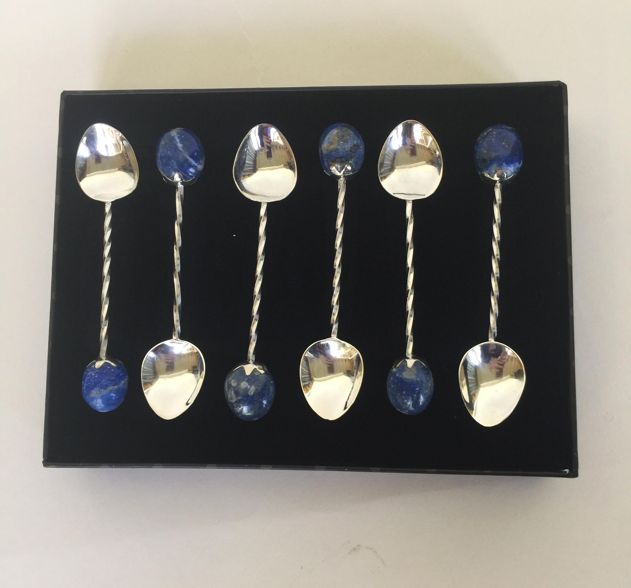 This set of 6 rhodium-plated sterling silver teaspoons with lapis lazuli stones are elegant, with spiral handles. These vintage spoons were re-imagined by Marina J.  A polished large lapis lazuli stone is set at the end, giving each spoon a unique