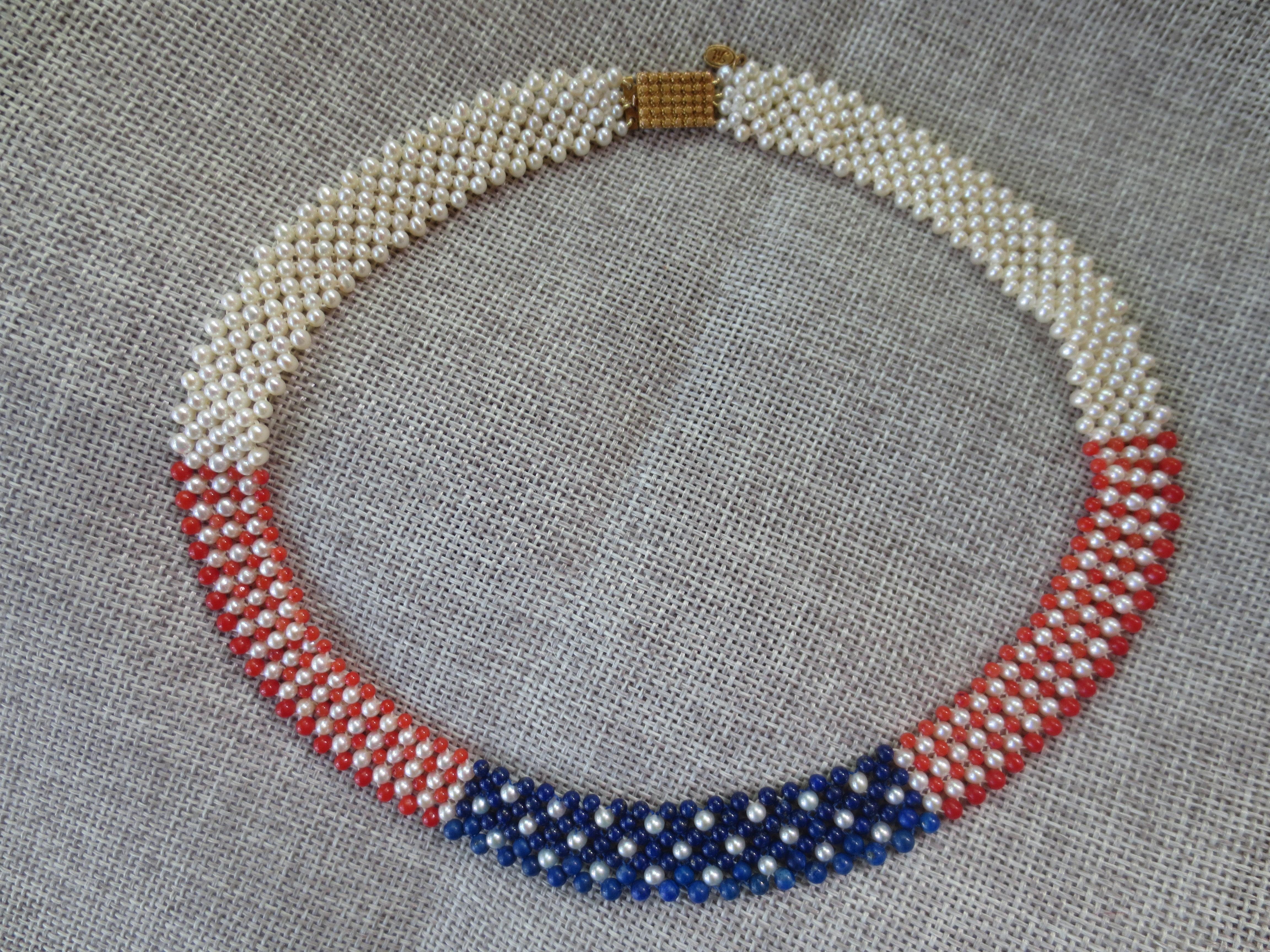 This American flag woven pearl, coral, and lapis lazuli, the necklace is designed by Marina J for your 4th of July festivities. Woven together are 2.5-3 mm beads of pearls, coral, and lapis lazuli to create this marvelous and patriotic American flag