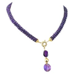 Marina J. Collana in corda intrecciata con ametista e oro massiccio 14k