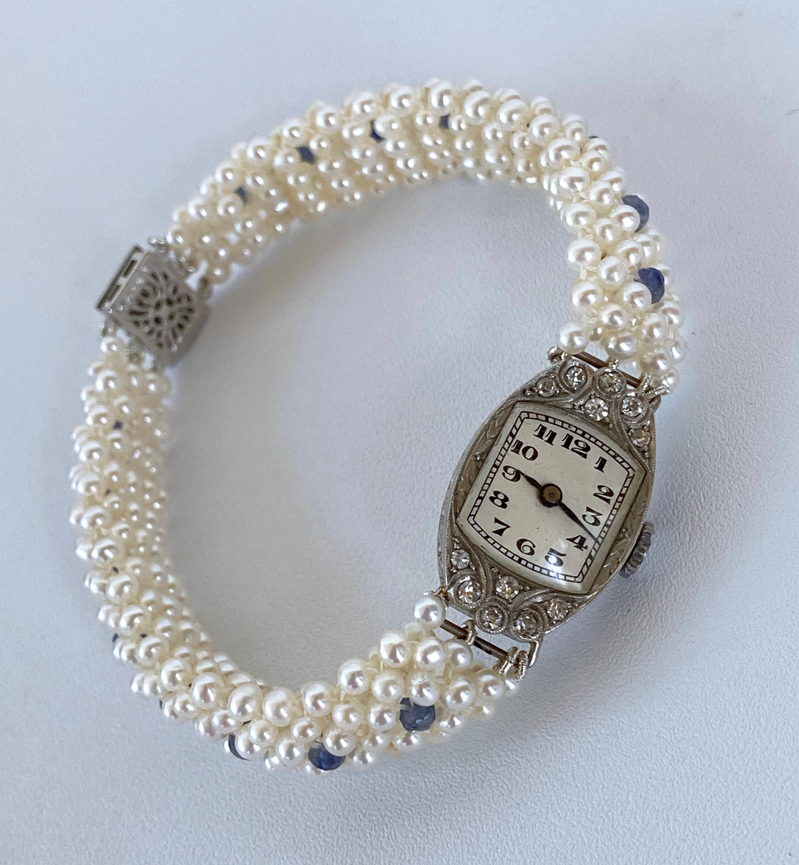 Marina J. Montre vintage en platine et diamants avec saphir bleu et perles en vente 1