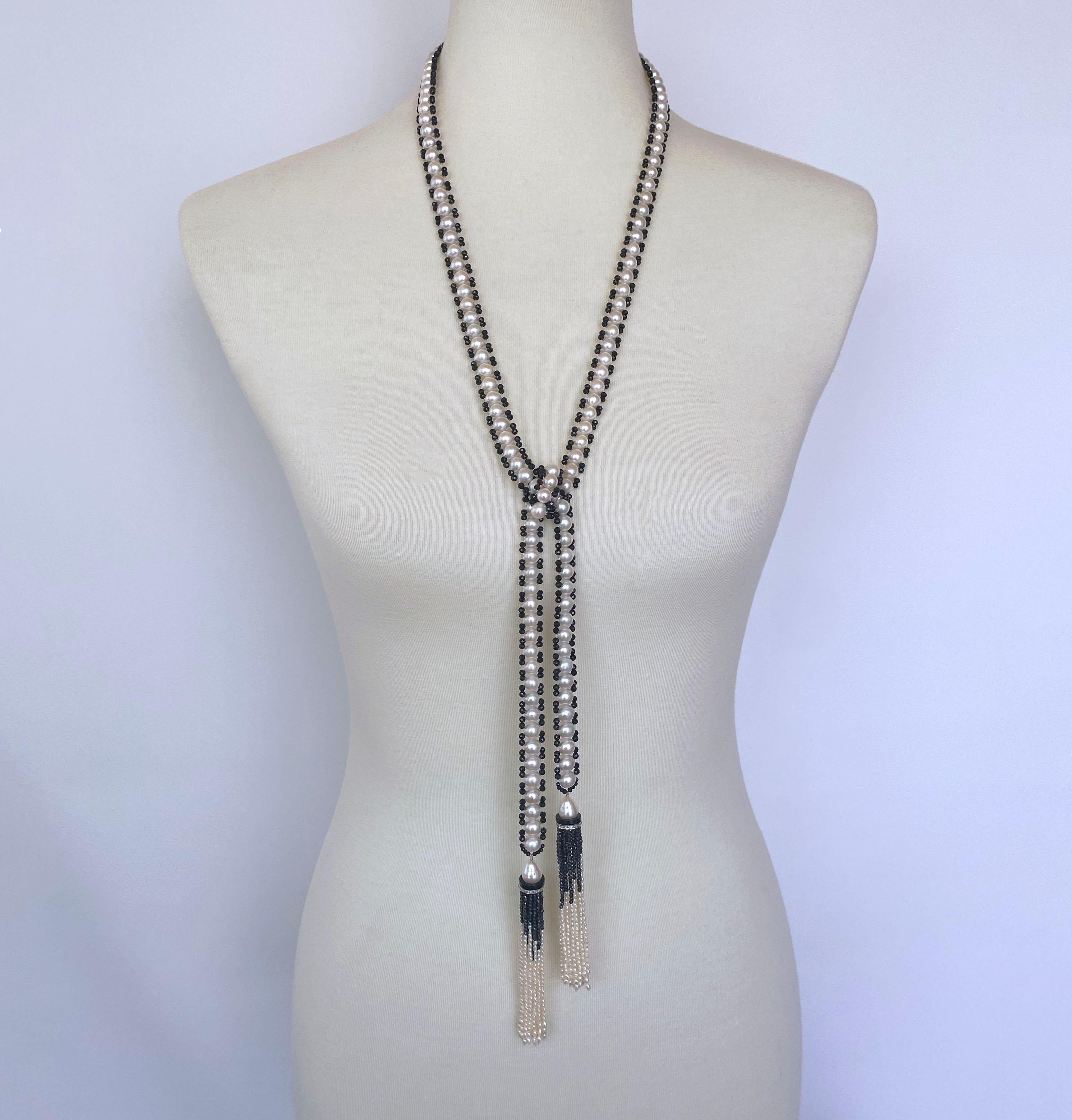 Gorgeous Marina J. hand woven Sautoir. This piece features perfectly round Pearls which display a wild sheen and luster, bordered by faceted Black Onyx beads, which catch light and shine wonderfully. Each Pearl was individually chosen giving the