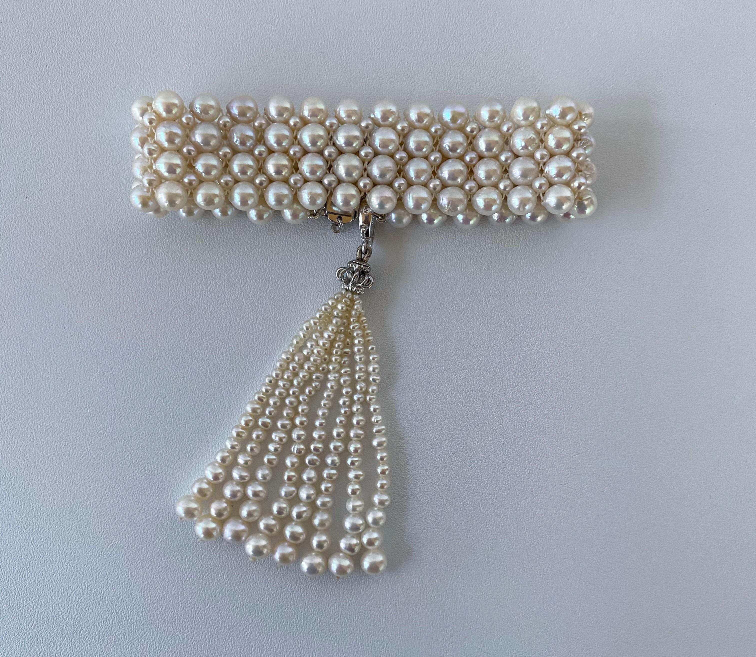 This roaring 1920s' inspired Art Deco bracelet features intricately woven pearls. Art Deco jewelry has been adorned by ladies of the period looking for a little more drama to their look. Elegant hand woven cultured 4.5mm and 2mm pearls meet at a