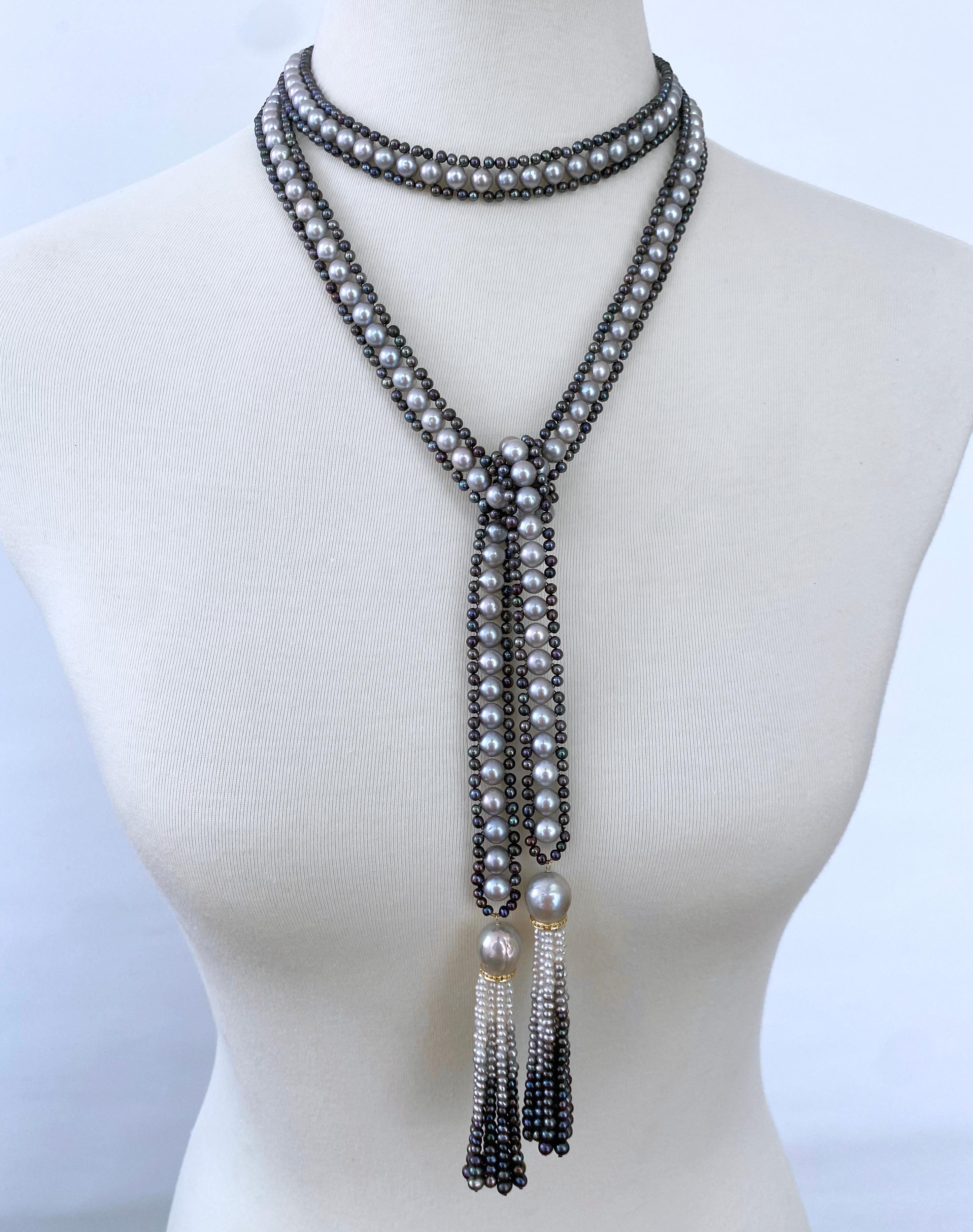 Stunning Sautoir by Marina J.

This piece is made with all natural Pearls, Gold Plated Silver & Diamonds. Measuring 50 inches sans Tassels, this open Sautoir is made with Grey and Black Pearls woven together into a tight column. The Black Pearls