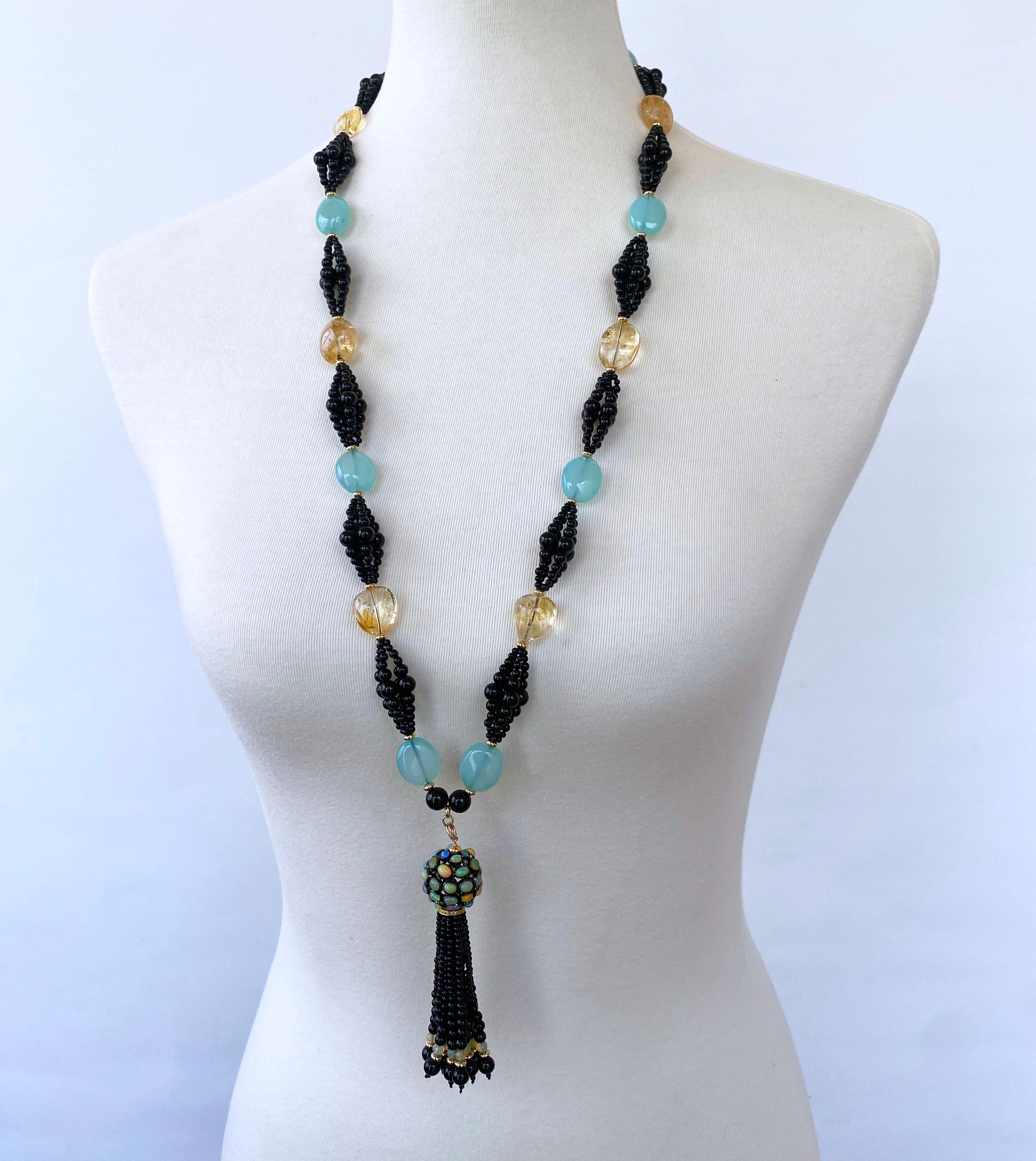 Gorgeous One of A kind Infinity Necklace by Marina J. 

Measuring 35 inches long sans Tassel, this necklace is made with all Black Onyx, Citrine & Chalcedony which are adorned by 18k Yellow Gold Plated - Silver beads and solid 14k Yellow Gold