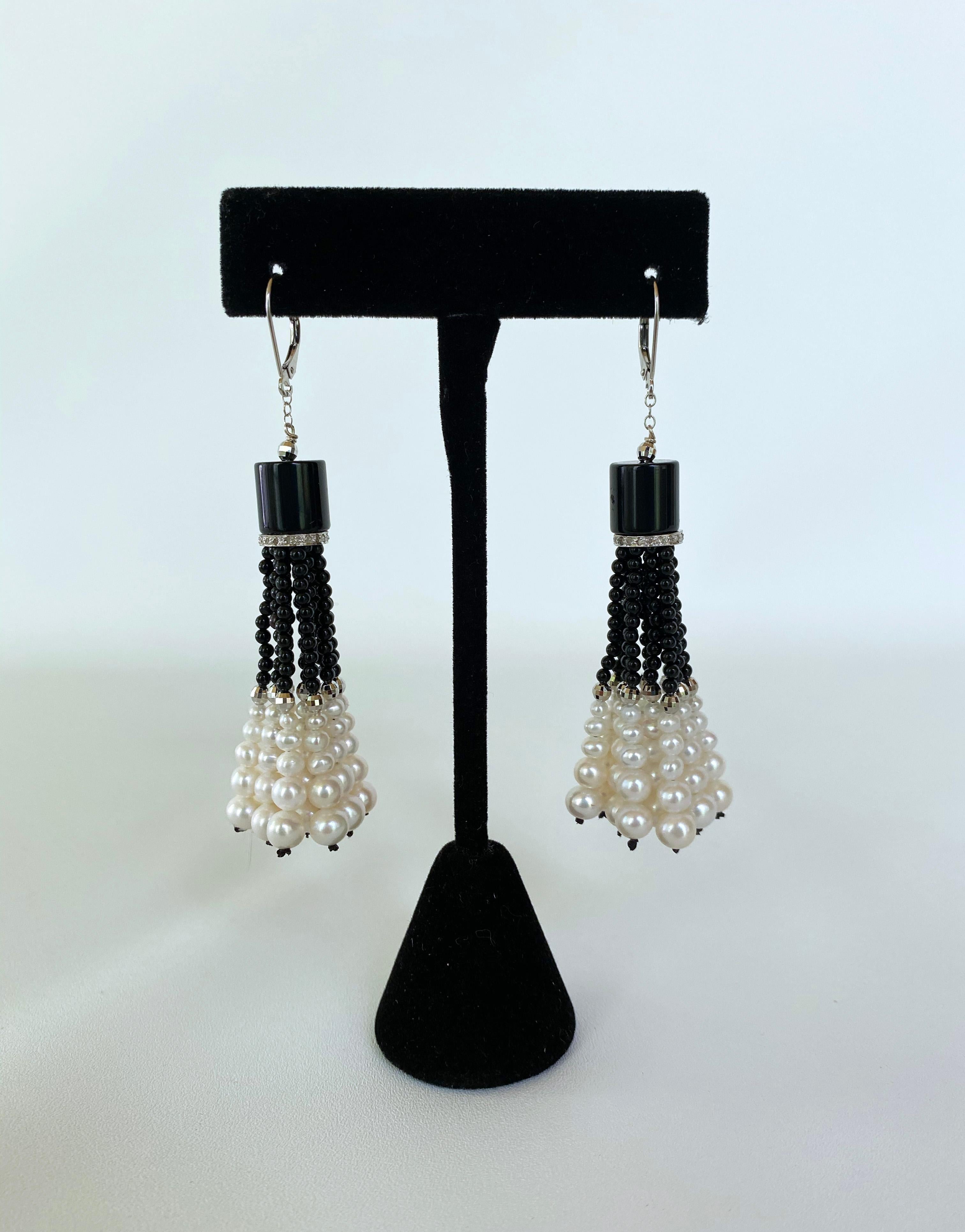 Art Deco inspired Earrings by Marina J. This nostalgic pair feature a cylindrical Black Onyx bead sitting atop a White Gold plated Silver -  Diamond encrusted roundel - from which graduated strands of Black Onyx, White Gold plated Silver findings