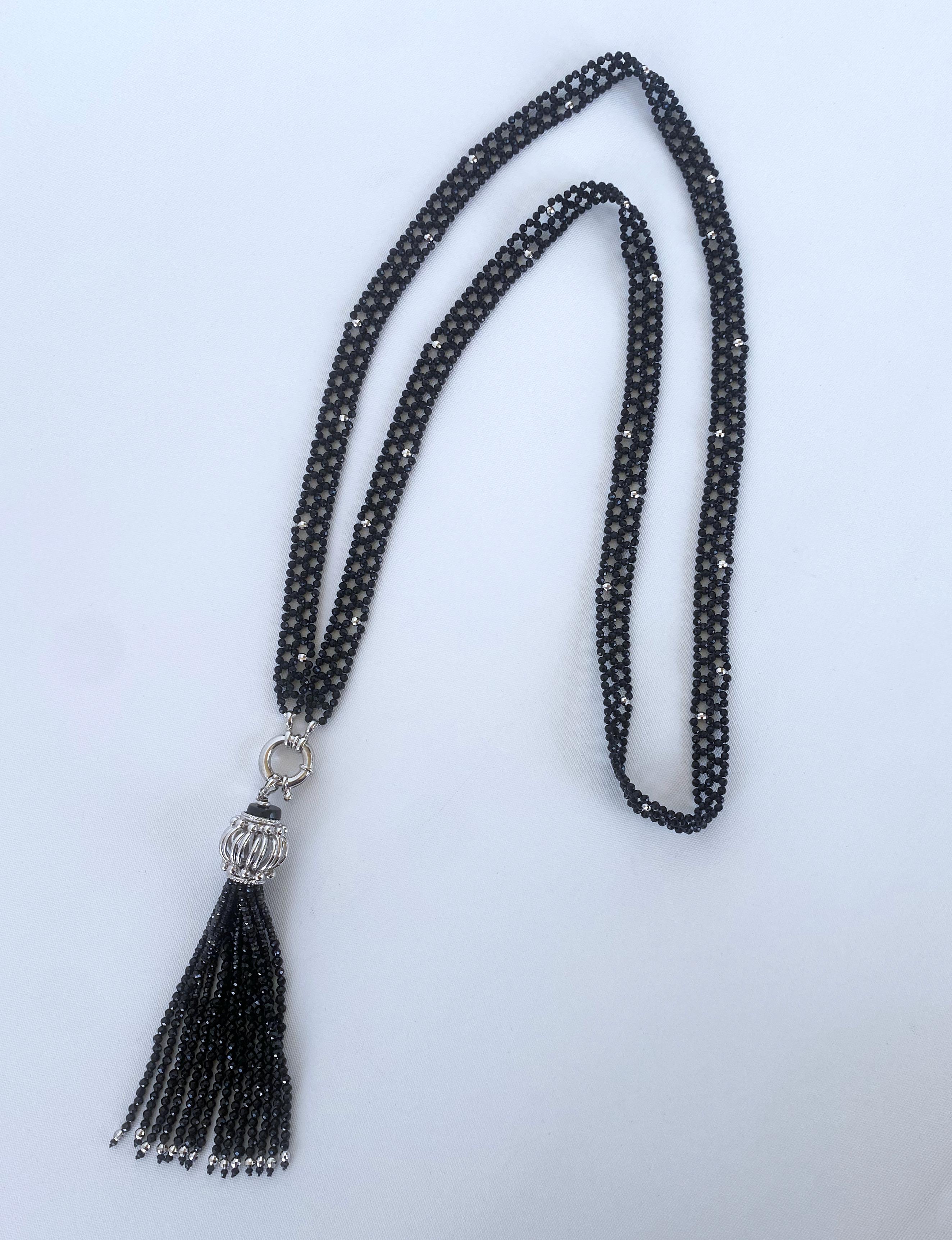 Striking One of A Kind Art Deco Inspired Black Sautoir by Marina J. This elegant piece features thousands of faceted Black Spinels all intricately woven together in a fine Lace like design. The faceted Spinel carry a thunderous shine and glisten