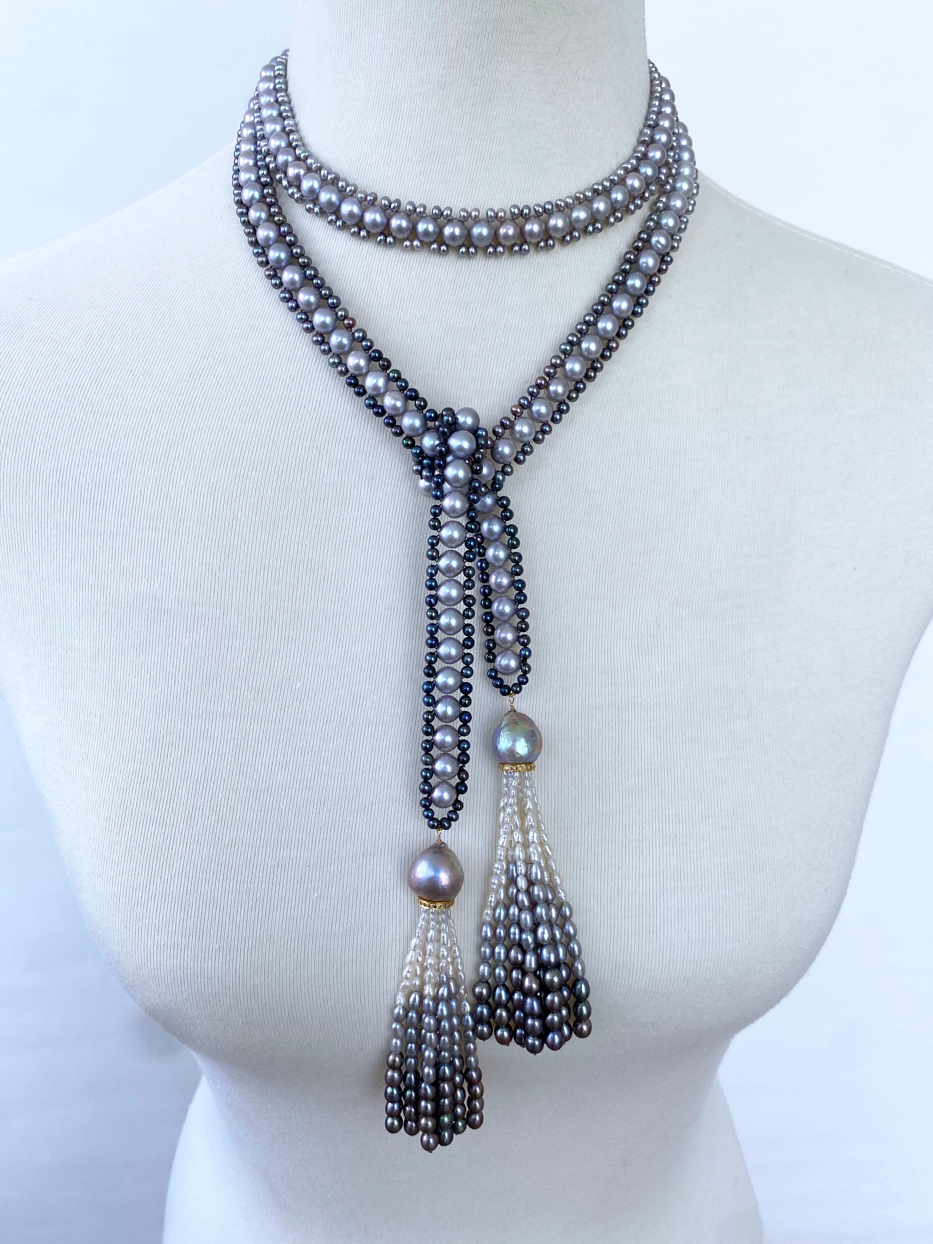 Stunning One of A Kind piece by Marina J.

This Sautoir is made with all cultured Pearls, Solid 14k Yellow Gold Wiring and Silver. Measuring 43 inch sans Tassels, this Sautoir's gorgeous Pearls all display multi colored iridescent luster that give a