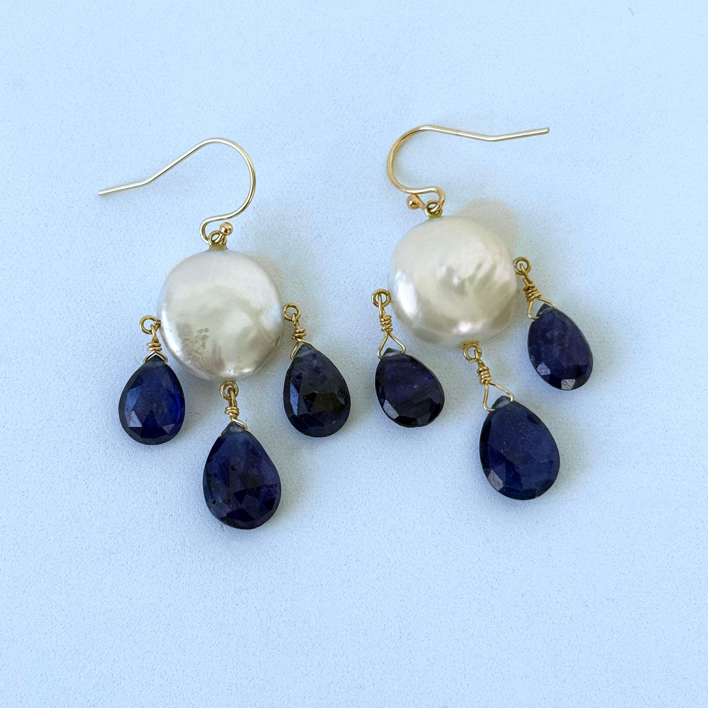 Beautiful pair of Faceted Blue Kyanite Chandelier Earrings by Marina J. 
This pair is made using all solid 14k Yellow Gold wiring and organic stones. Two large flat coin Pearls with a soft iridescence and sheen are used in this pair. This pair