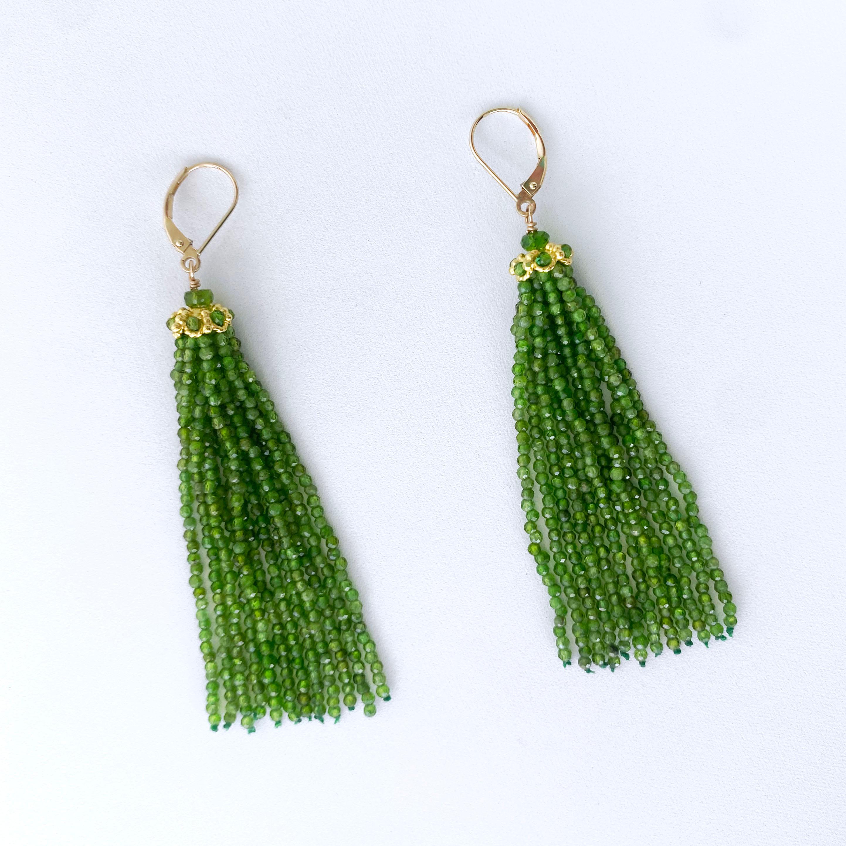 Pair of Tassel Earrings by Marina J. This pair is made with all Faceted Chrome Diopside and solid 14k Yellow Gold. The Chrome Diopside display a vibrant Green color that radiates stunning hues due to the stone's semi translucency. Measuring 3.25