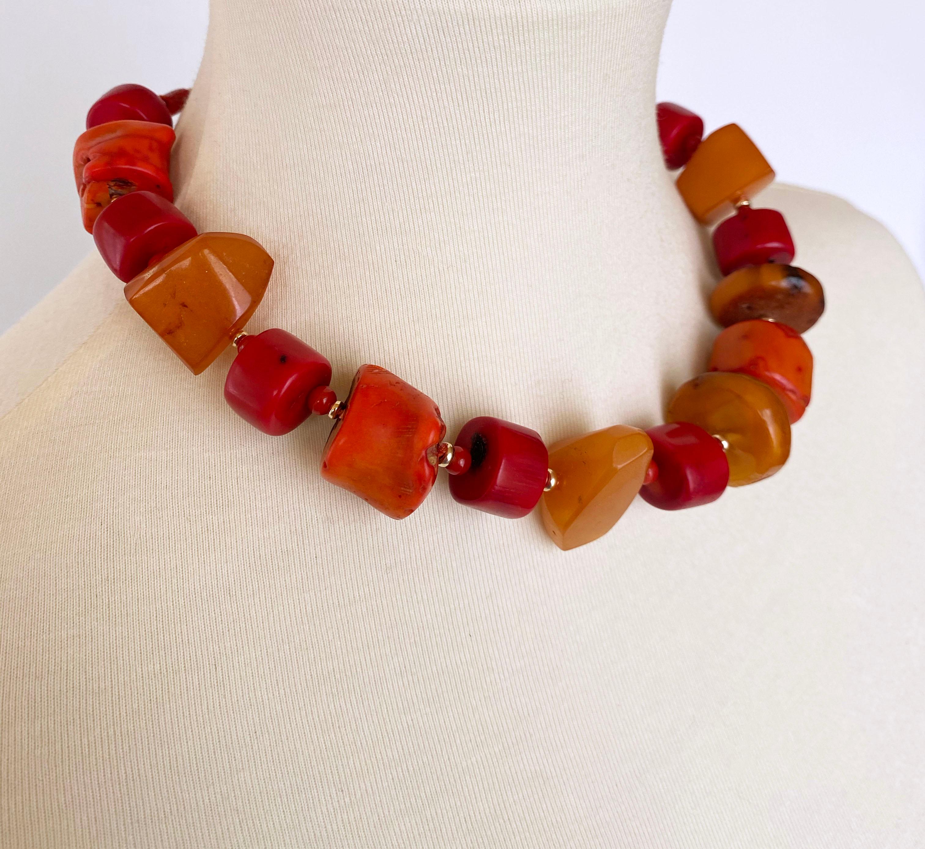 This vibrant and loud necklace features beautiful multi shade Corals and Amber which display radiant tones of Red, Orange, Yellow and Gold. Perfectly accented by small 14K Yellow Gold beads, this necklace also meets at a simple 14K Yellow Gold