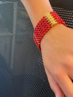 Pulsera trenzada «Marina J.» con coral y facetas, chapada en oro de 18k