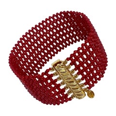 Marina J. Bracciale in corallo intrecciato con chiusura in argento placcato oro giallo 14k A. Silver