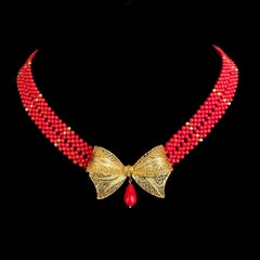 Marina J Coral Woven Necklace with 18k Plated Bowtie Centerpiece & Detailings
