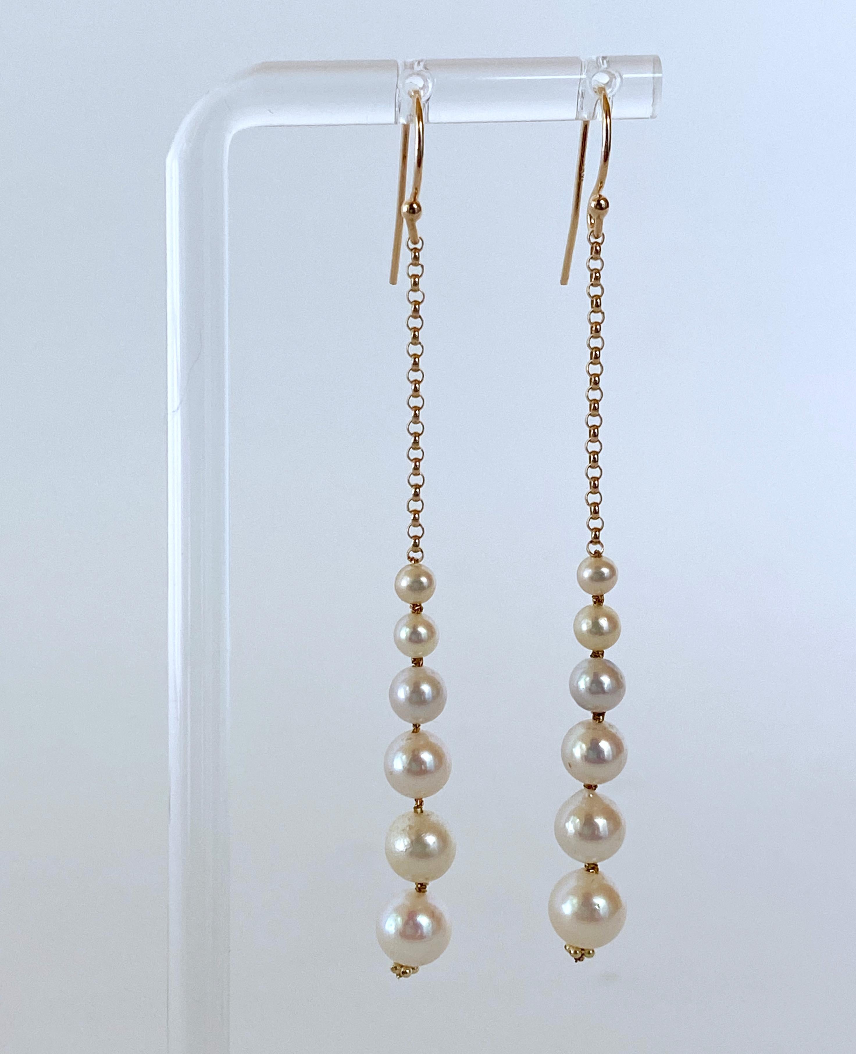 Marina J. Dangle Graduated Pearl Earrings with solid 14k Yellow Gold In New Condition For Sale In Los Angeles, CA