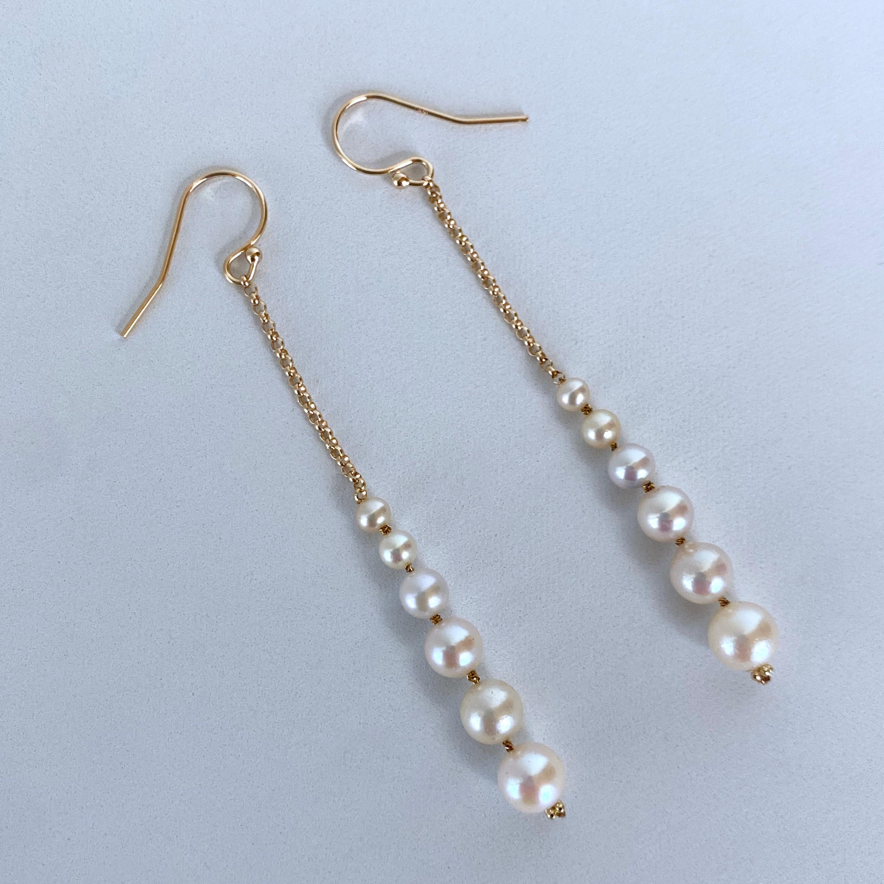 Women's Marina J. Dangle Graduated Pearl Earrings with solid 14k Yellow Gold For Sale