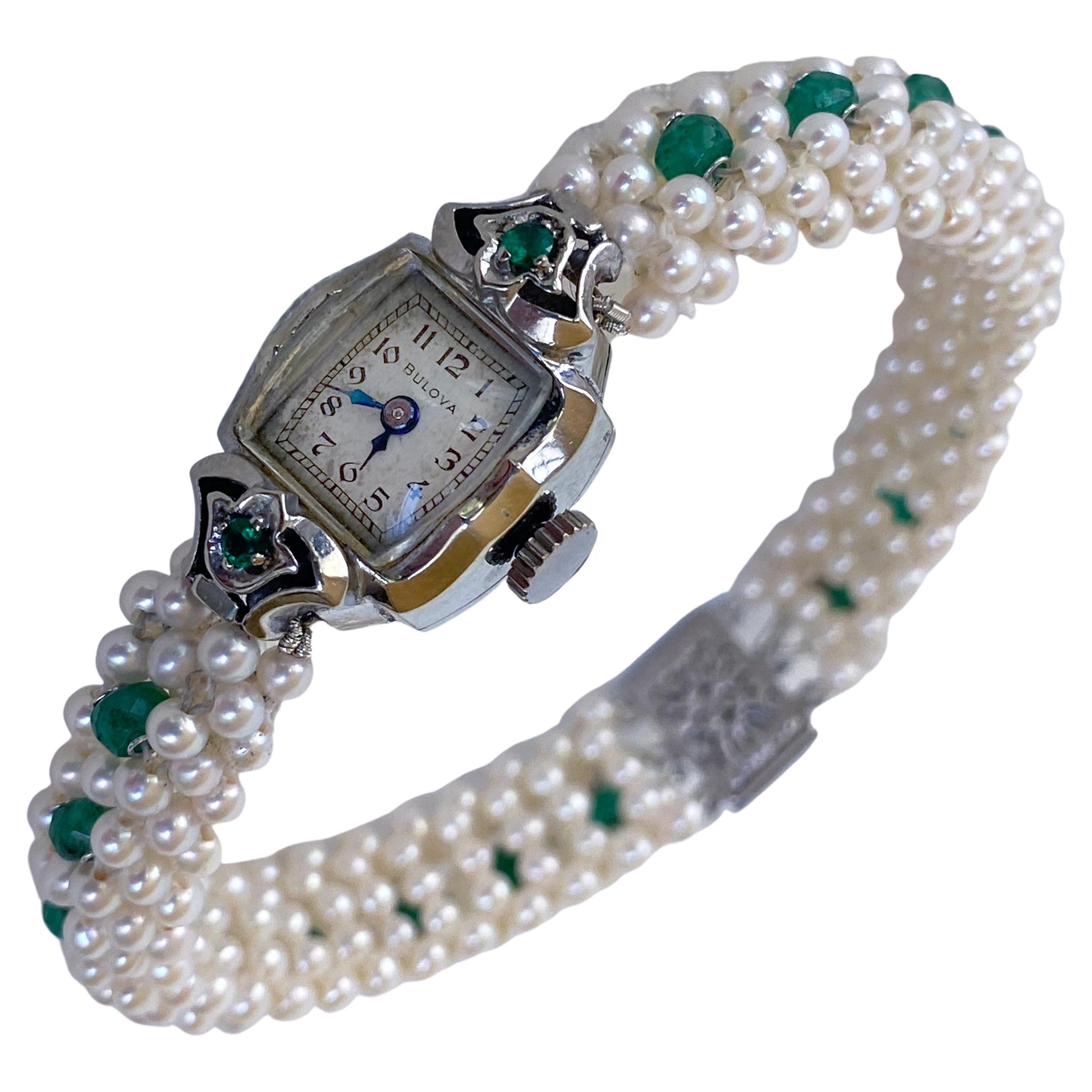 Marina J. Montre vintage incrustée d'émeraudes avec perles et or blanc 14 carats