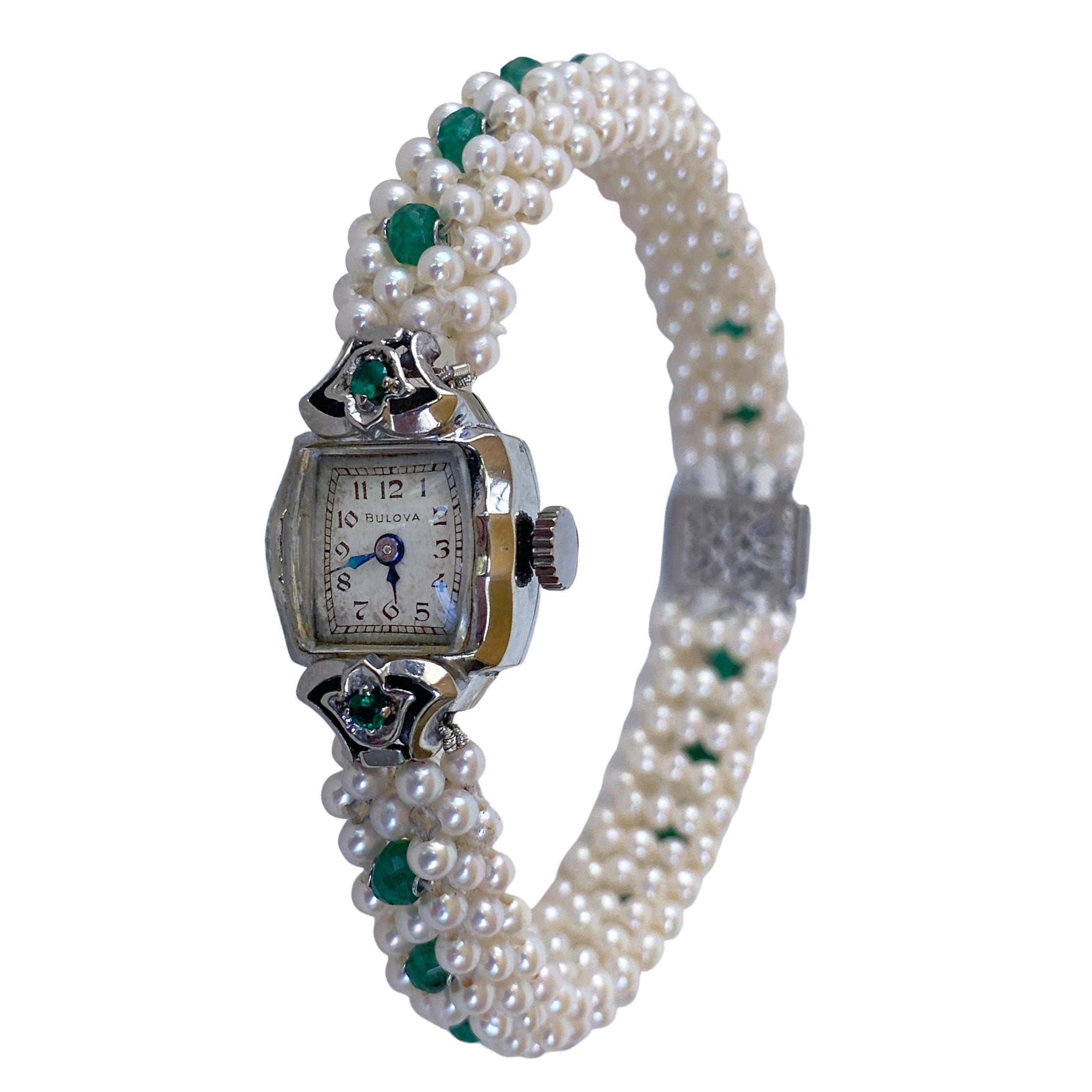 Marina J. Montre Vintage incrustée d'émeraudes avec perles tressées et or blanc 14k en vente