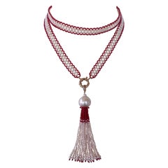 Marina J. Satuario di corallo e perle intrecciate con nappina barocca e oro giallo 14k