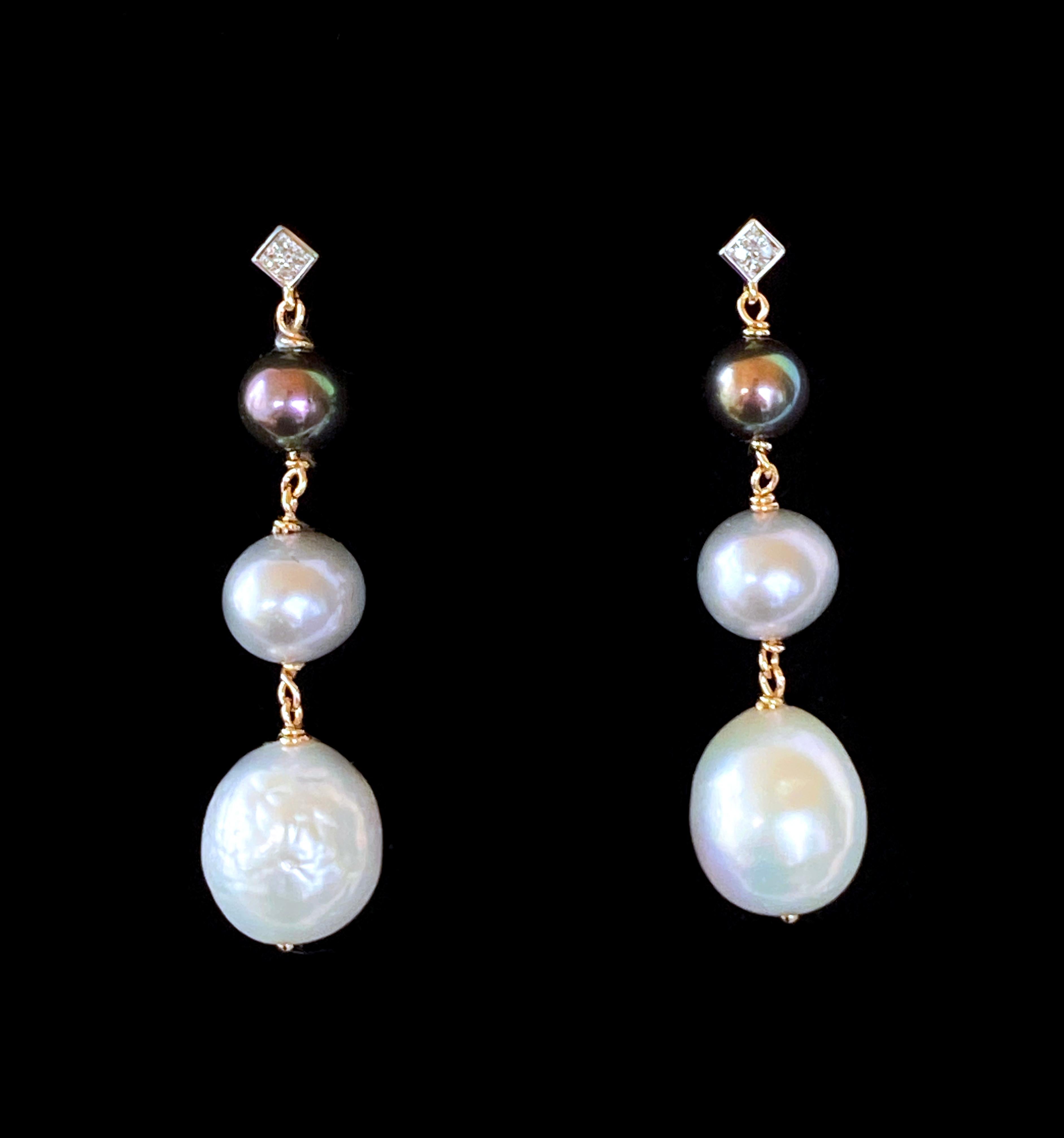 Stunning pair of earrings from Marina J. This pair features three Pearls hanging off a solid 14k Diamond encrusted Stud. The drop Pearls are both Graduated in size and hold a beautiful Black, Grey and White Ombre. Made with all 14k Yellow Gold