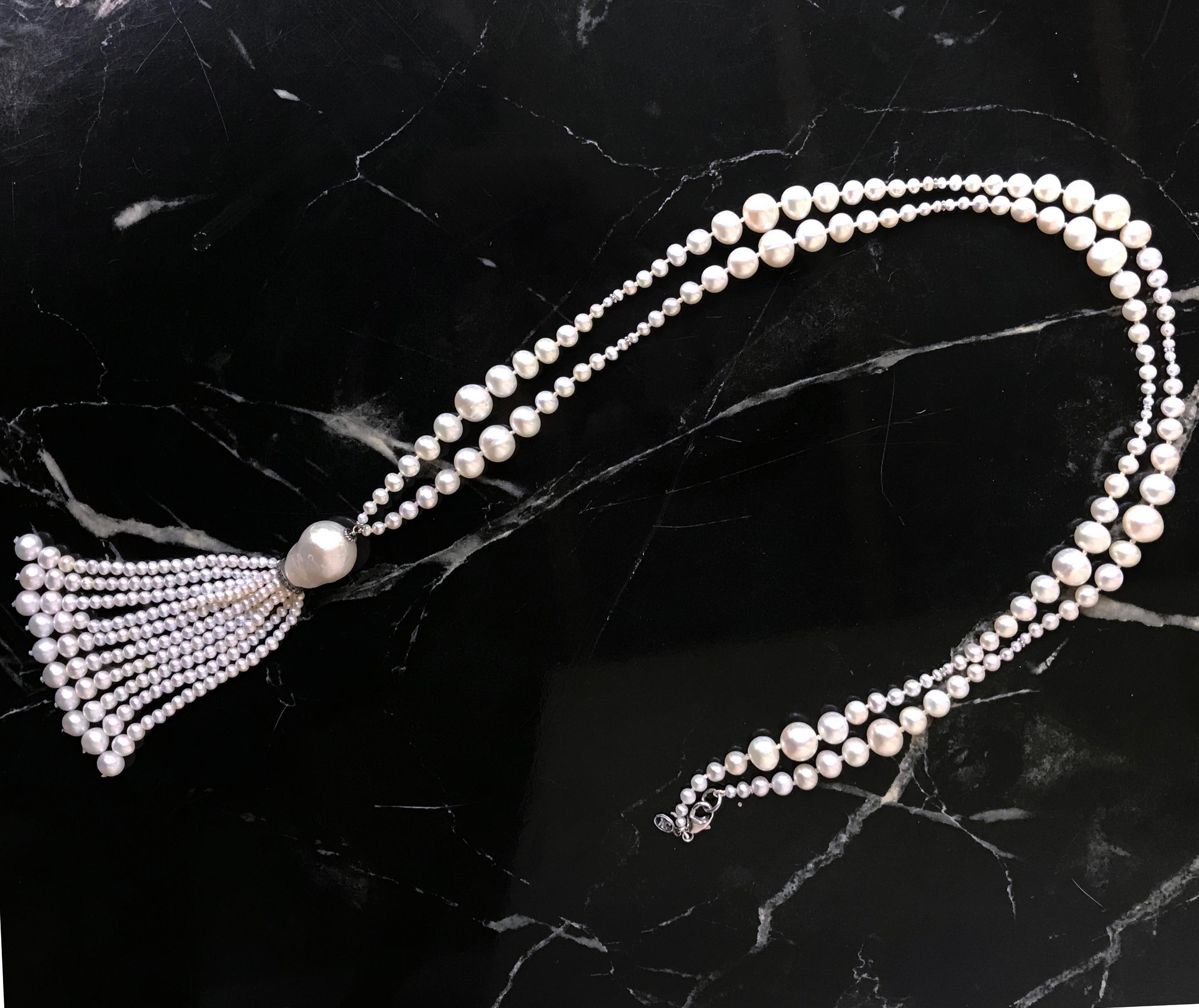 Marina J. Presents a classical and sophisticated white pearl sautoir with 14k white gold beads and a sterling silver roundel with encrusted diamonds. The sautoir has multiple graduated pearls from 1 mm to 8 mm. The beautiful tassel has a large