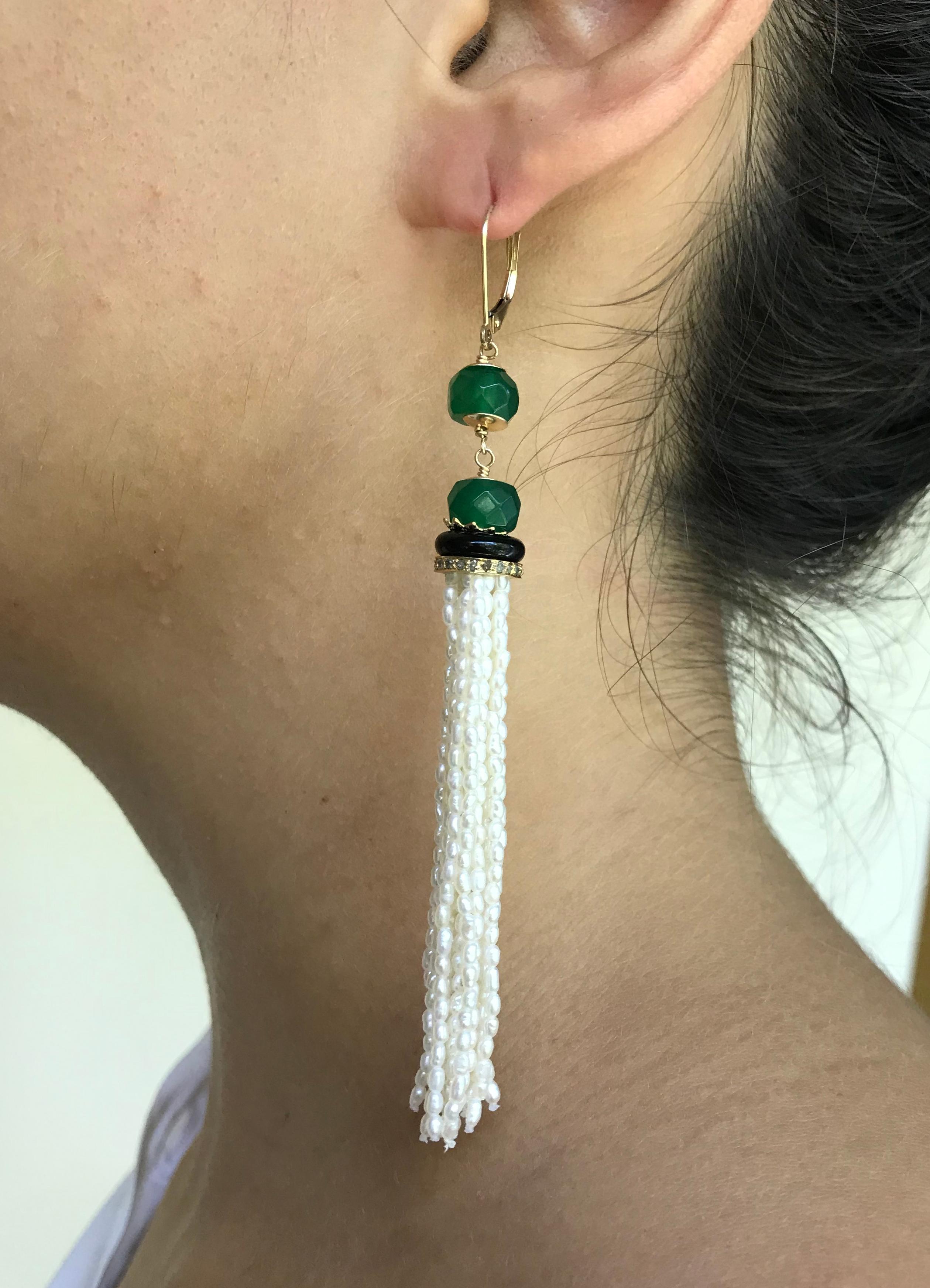 These beautiful Art Deco pearl, green and black onyx beaded with 14k yellow gold lever back and diamond-encrusted roundel earrings are stunning. They are beautifully handcrafted by Marina J. using a vibrant round green and black onyx stone nestled