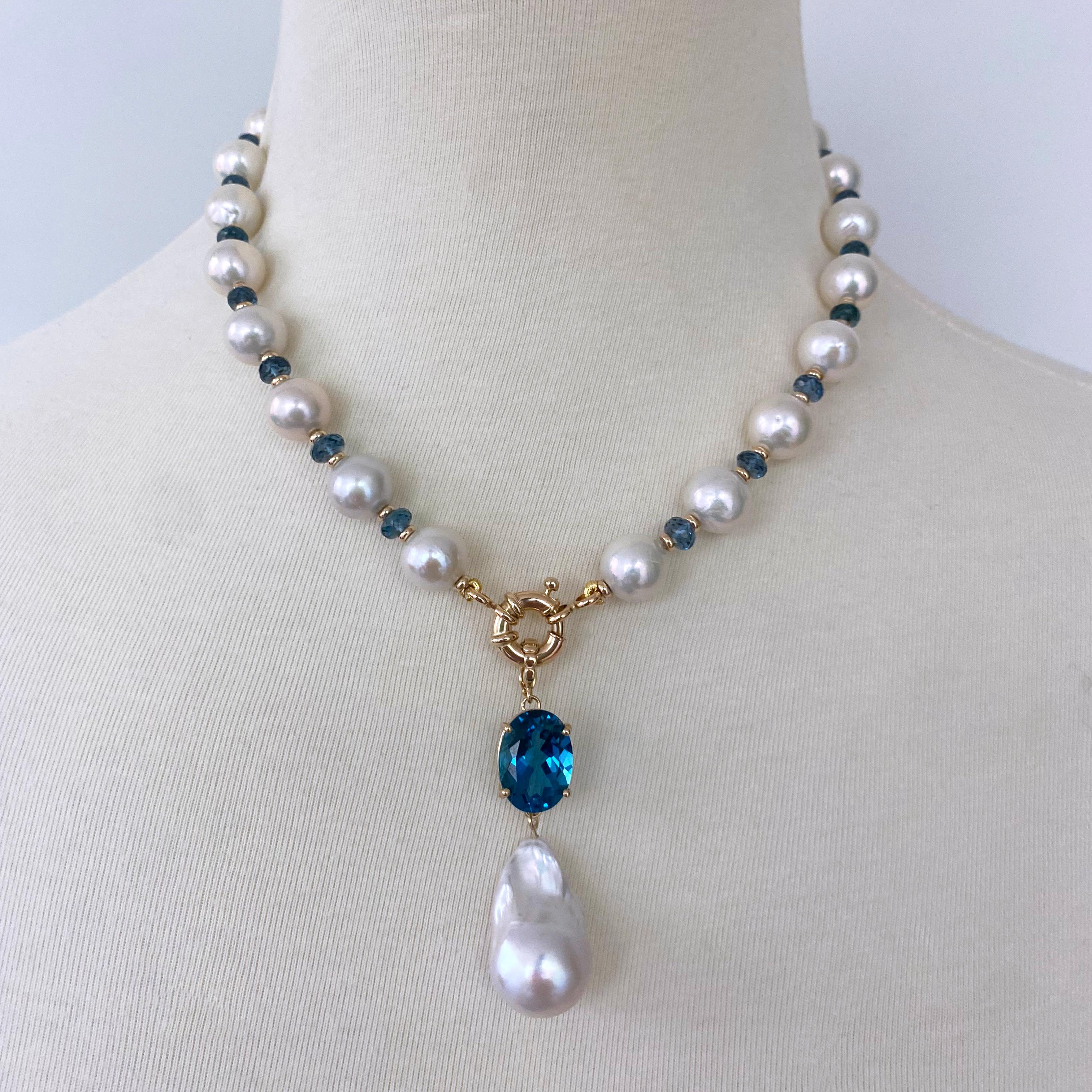 Stunning One of A Kind piece by Marina J. This Necklace is made with all cultured Pearls, London Blue Topaz & Solid 14k Yellow. The Pearls display a fabulous iridescence giving a soft multi color luster, which accentuates the Faceted London Blue