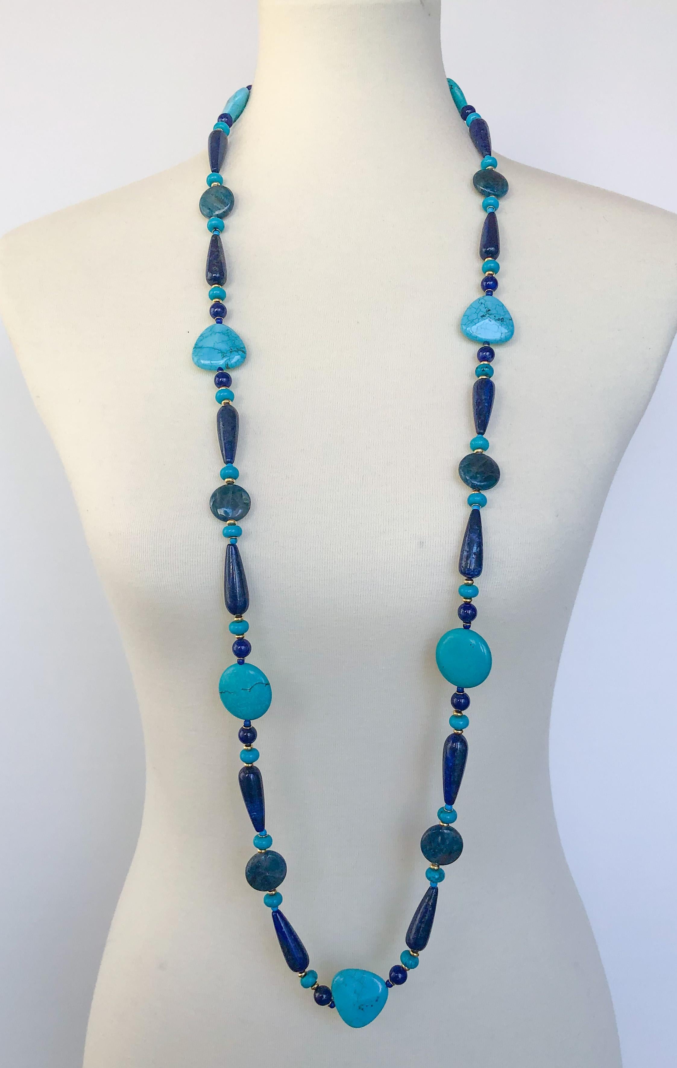 Gorgeous piece by Marina J. This vibrant Necklace features multi shaped and colored Turquoise, Appatite and Lapis Lazuli stones. Gold plated silver beads adorn this Necklace and perfectly compliment all the Blues in the piece. Measuring 45 inches