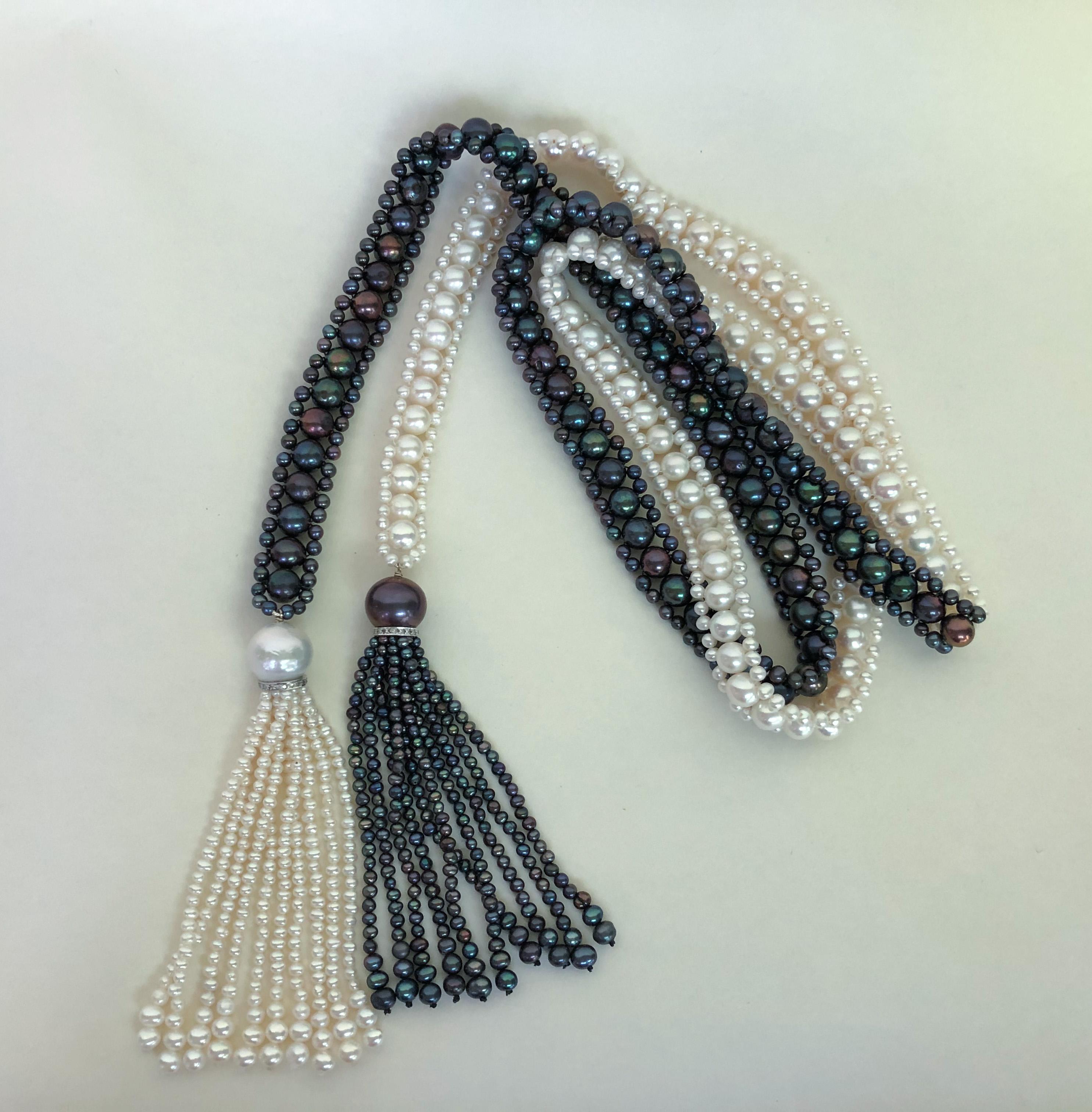 This beautiful and dramatic necklace draws its inspiration from the Art Deco color contrast and composition. This versatile necklace can be worn in a variety of different ways: long, wrapped, and tied, with or without brooch (brooch NOT included in
