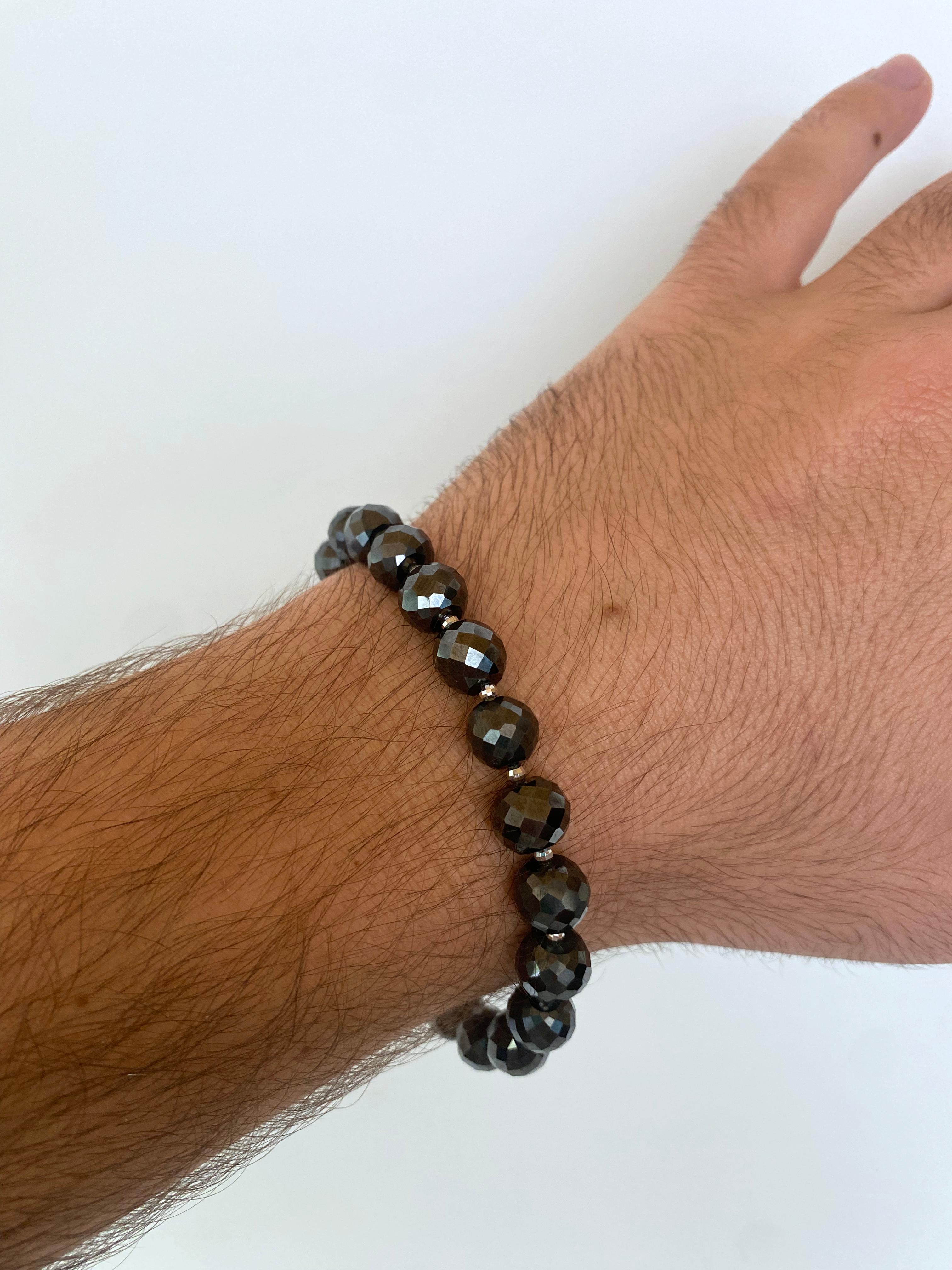 Men's Bracelet by Marina J. This piece is made with all faceted and alternating stones featuring Black Spinel and small 925 Silver - Rhodium plated beads. The faceted Black Spinel display a soft dark luster while delivering a thunderous shine. The