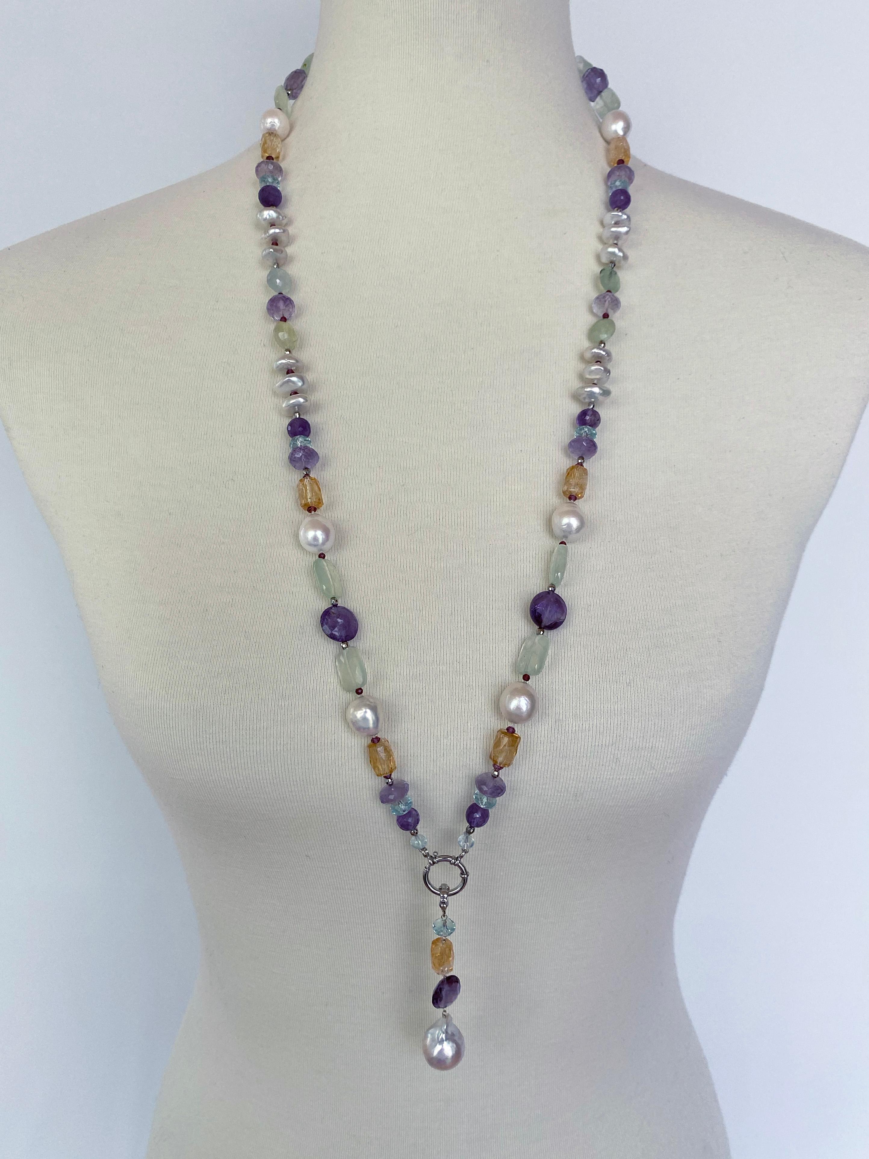 This gorgeous colorful and multi shaped, multi jewel Sautoir features different shaped high luster Pearls, Amethyst, Citrine, Aquamarine, and Chalcedony, beautifully complimented by small 14K white Gold and Garnet faceted beads in between. The