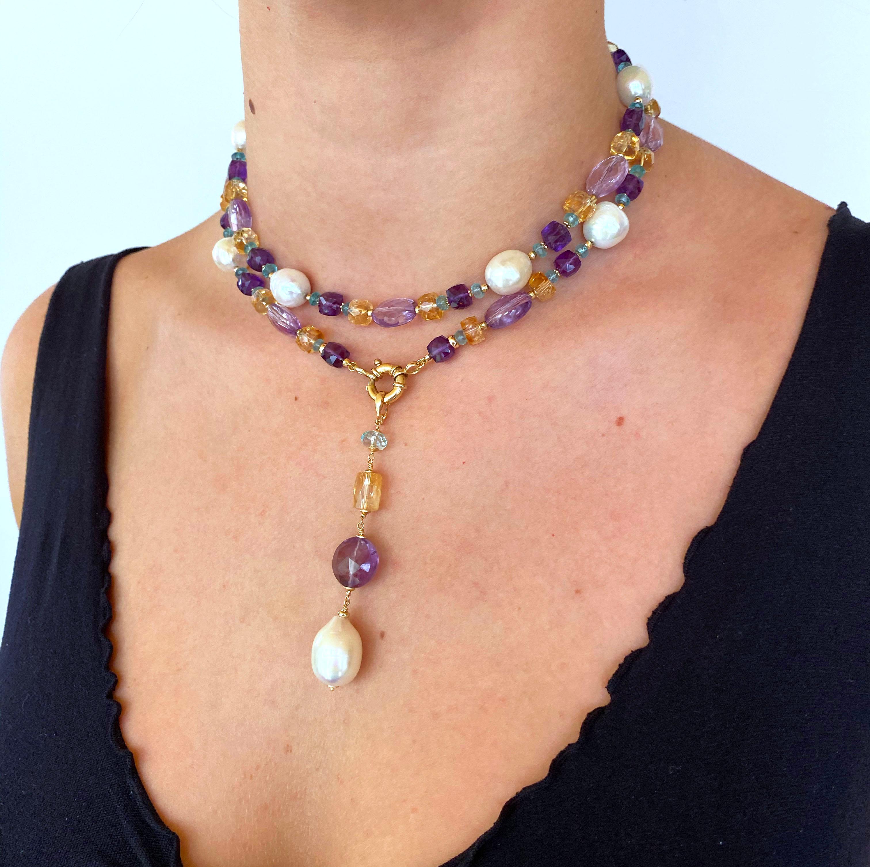 This gorgeous colorful and multi shaped, multi jewel Sautoir features different shaped high luster Pearls, Amethyst, Citrine and Aquamarine beautifully complimented by small multi shaped 14K Yellow Gold beads. This Sautoir meets at a 14K Yellow Gold