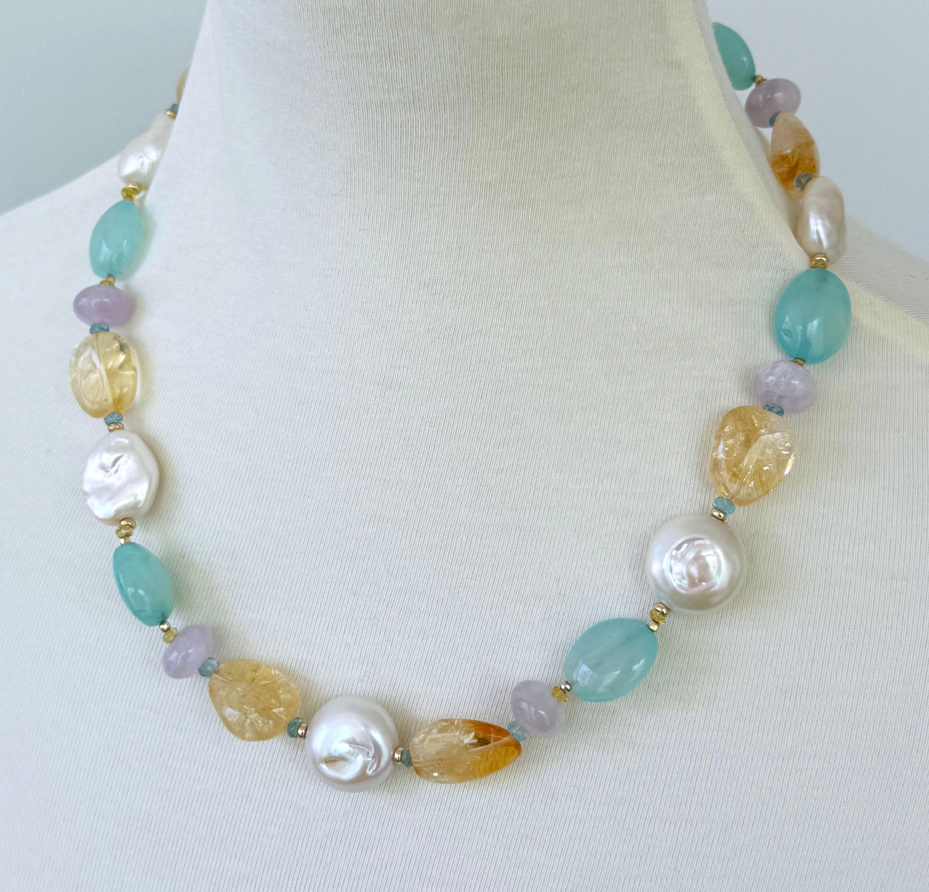 Beautiful Spring and Summertime Necklace by Marina J.

This bright and colorful piece is made with all Baroque Pearls displaying beautiful iridescent, Citrine, light Amethyst and aqua Chalcedony, all adorned with Solid 14k Yellow Gold findings