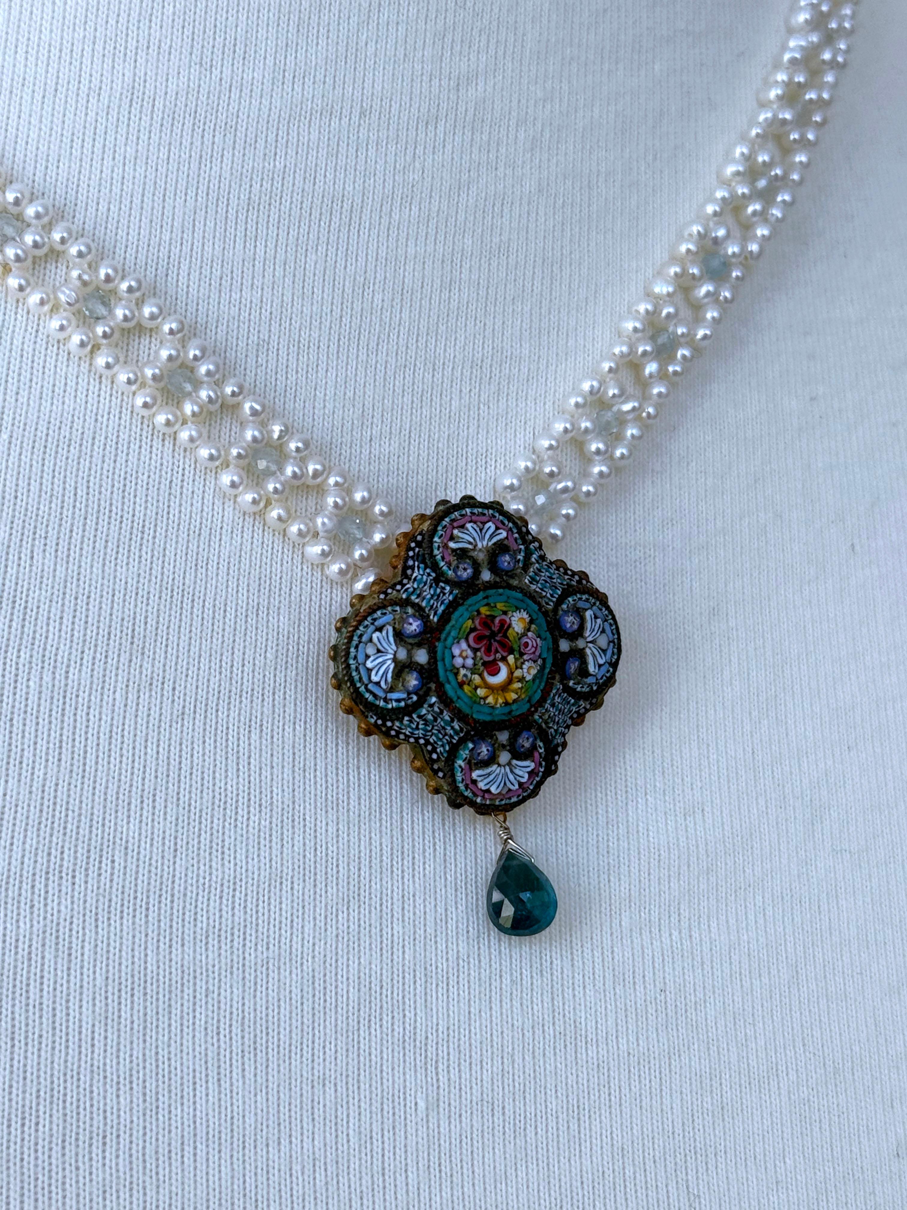 A Vintage Floral Mosaic Brooch has been reworked into a One of A Kind Centerpiece for this Pearl Necklace. The Mosaic piece holds a 