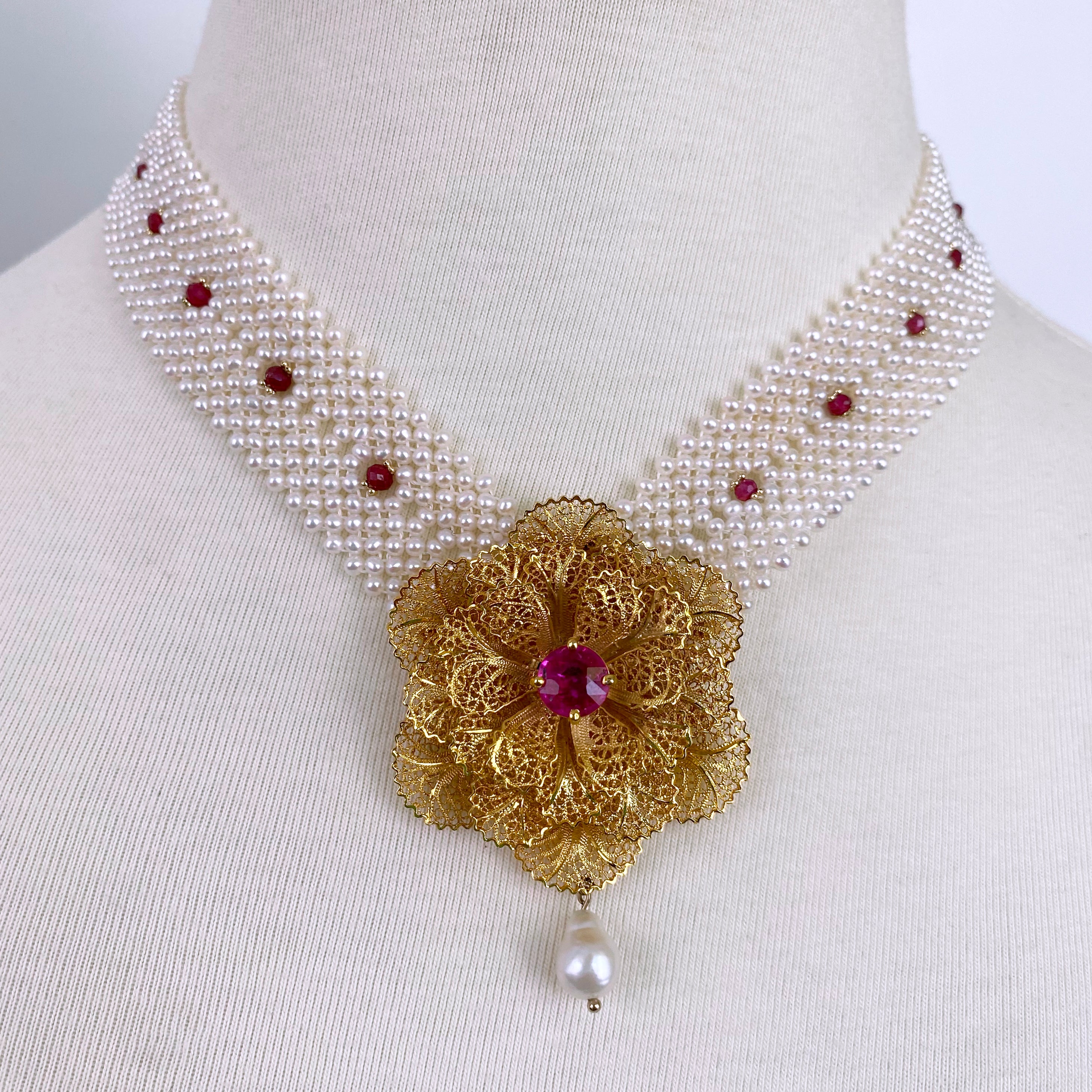 One of A Kind Necklace by Marina J.
This piece was made with an Antique Floral brooch, reworked as the centerpiece. The 18k Yellow Gold Plated - Silver Floral brooch holds beautiful Filigree details, Pearl drop and a stunning 2 karat faceted Pink