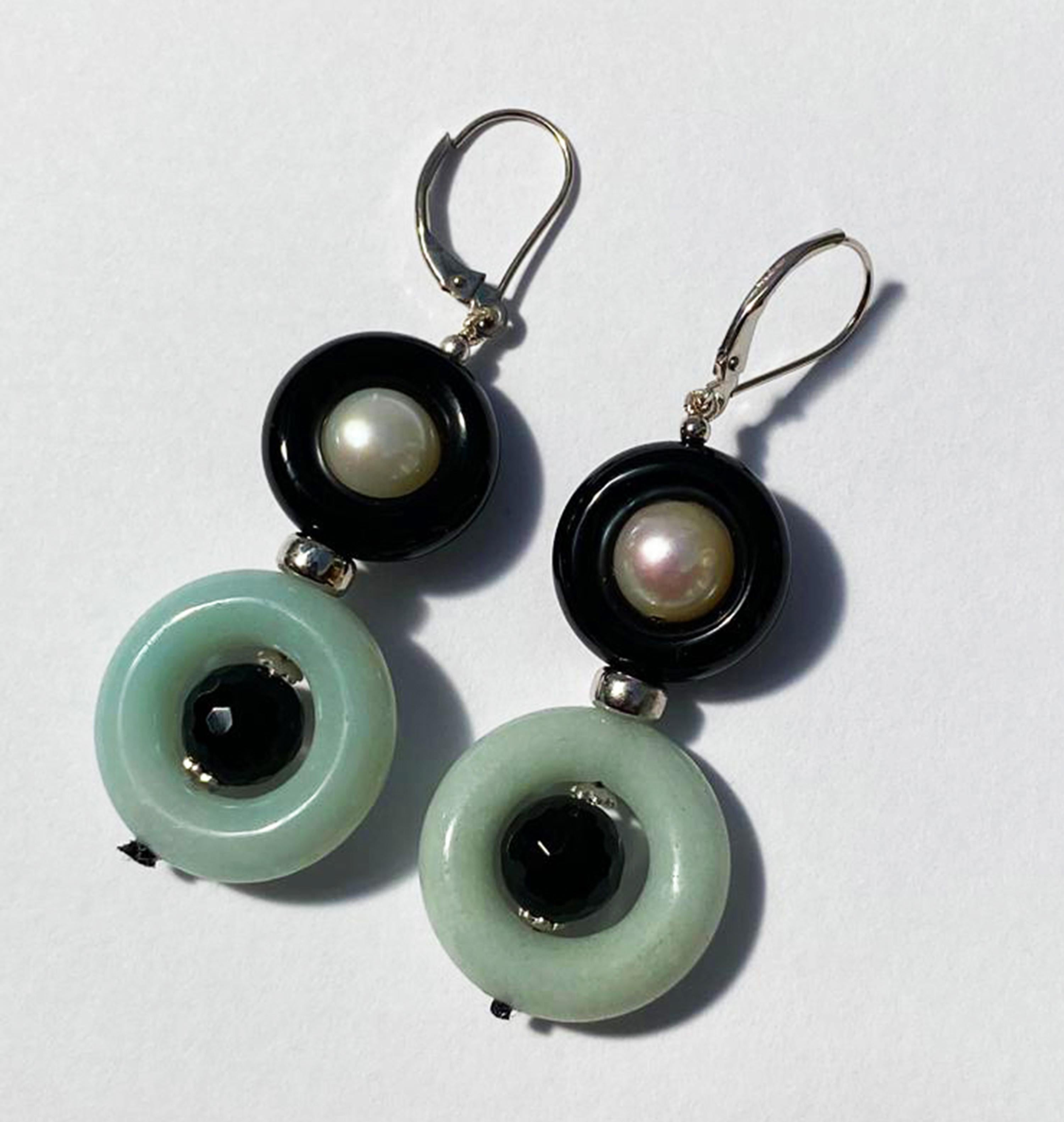 These elegant and sophisticated black onyx bead ring with pearls and jade beads earrings are a must-have. They are handcrafted with 14k white gold findings, beads, and lever-back making the piece beautiful and bold. The onyx bead rings contrast with