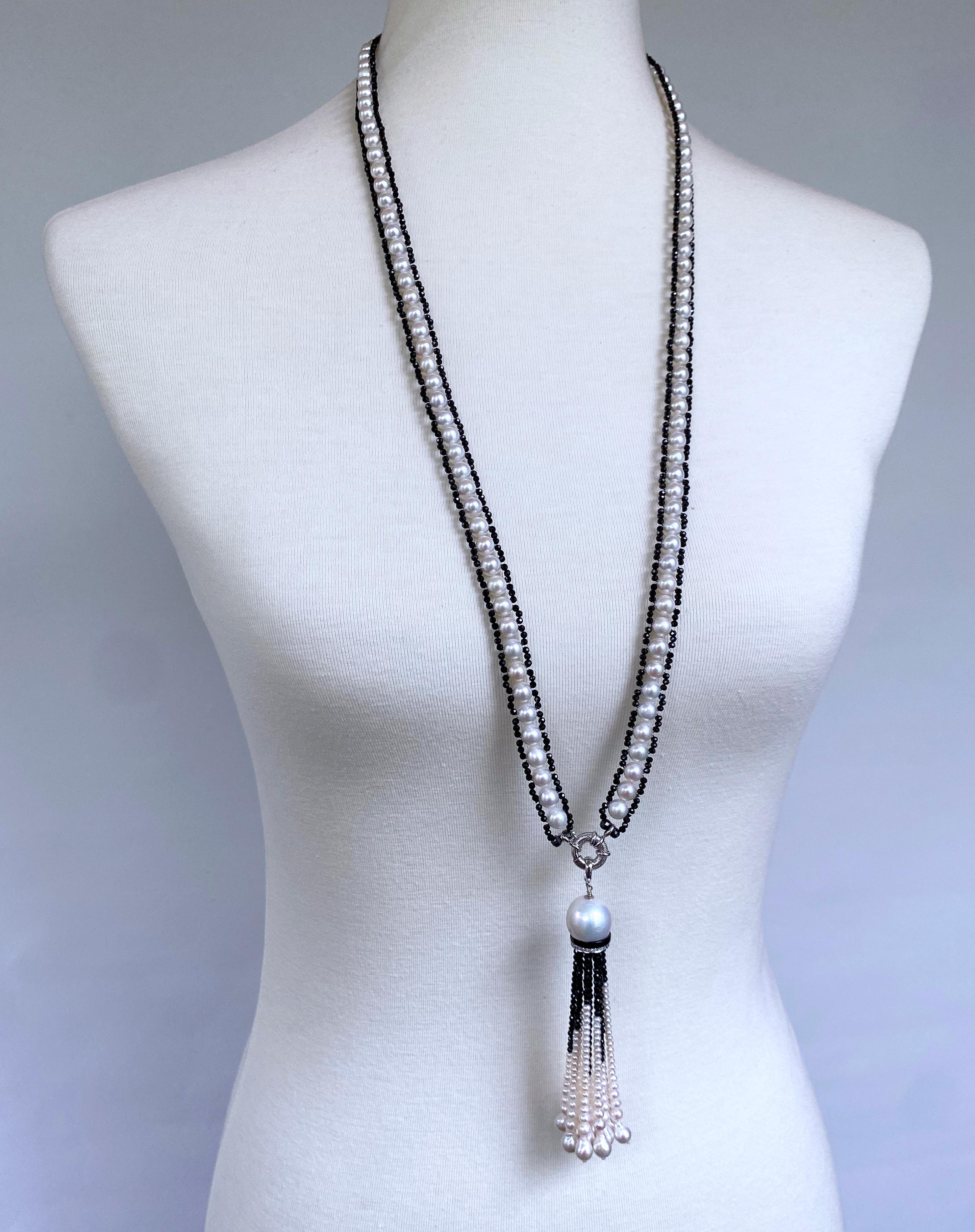 Gorgeous piece by Marina J. This Sautoir features beautiful White Cultured Pearls all intricately woven with and adorned by Faceted Black Spinel. The Spinel display a thunderous shine, glistening with every step. Measuring 35 inches long, this