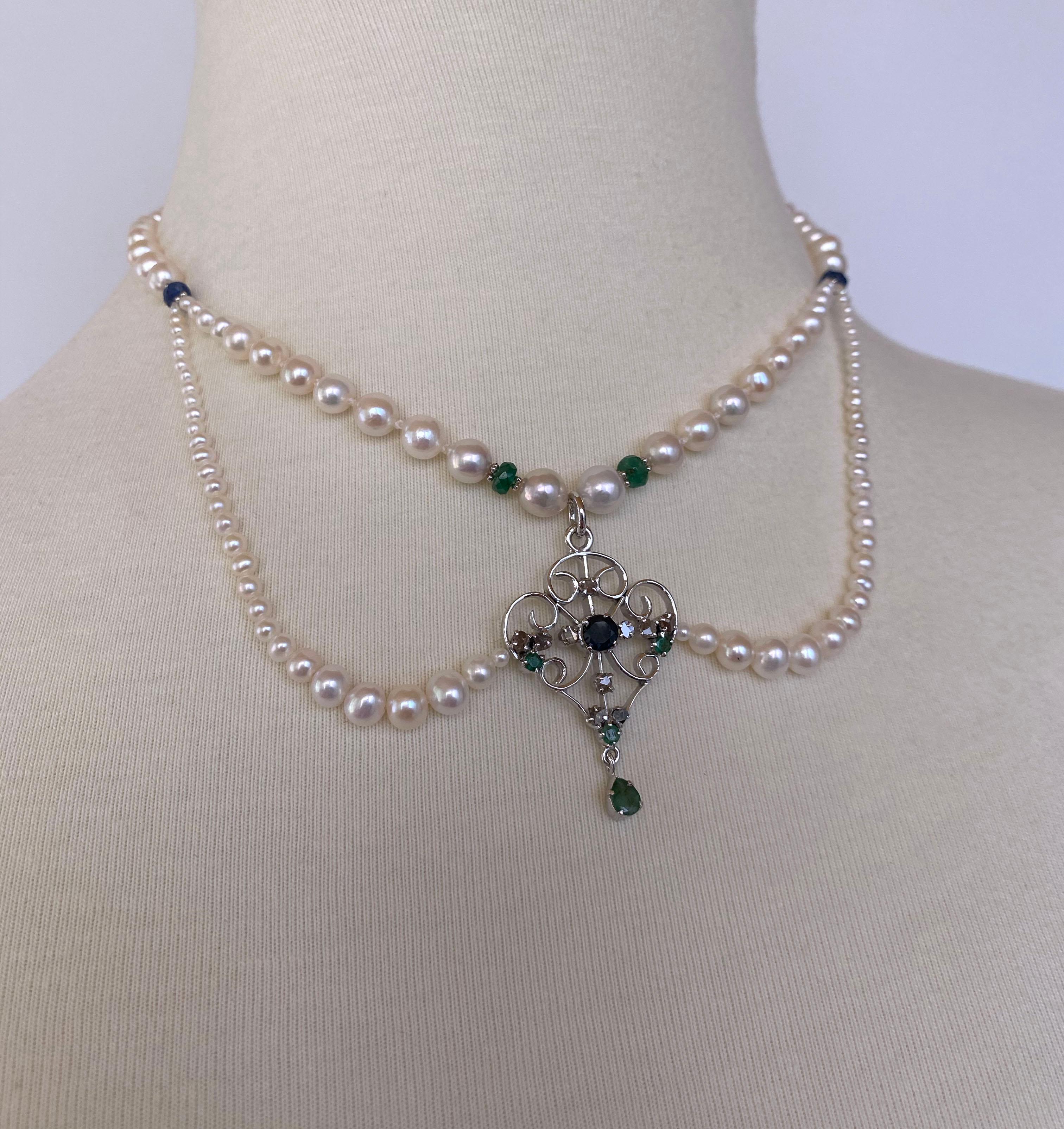 Gorgerous 14k White Gold plated- Silver Vintage Centerpiece has been reworked into a Pearl Necklace. This necklace features Graduated Pearl strands, adorned in faceted Emerald and Sapphire beads, and solid 14k White Gold findings. The Vintage